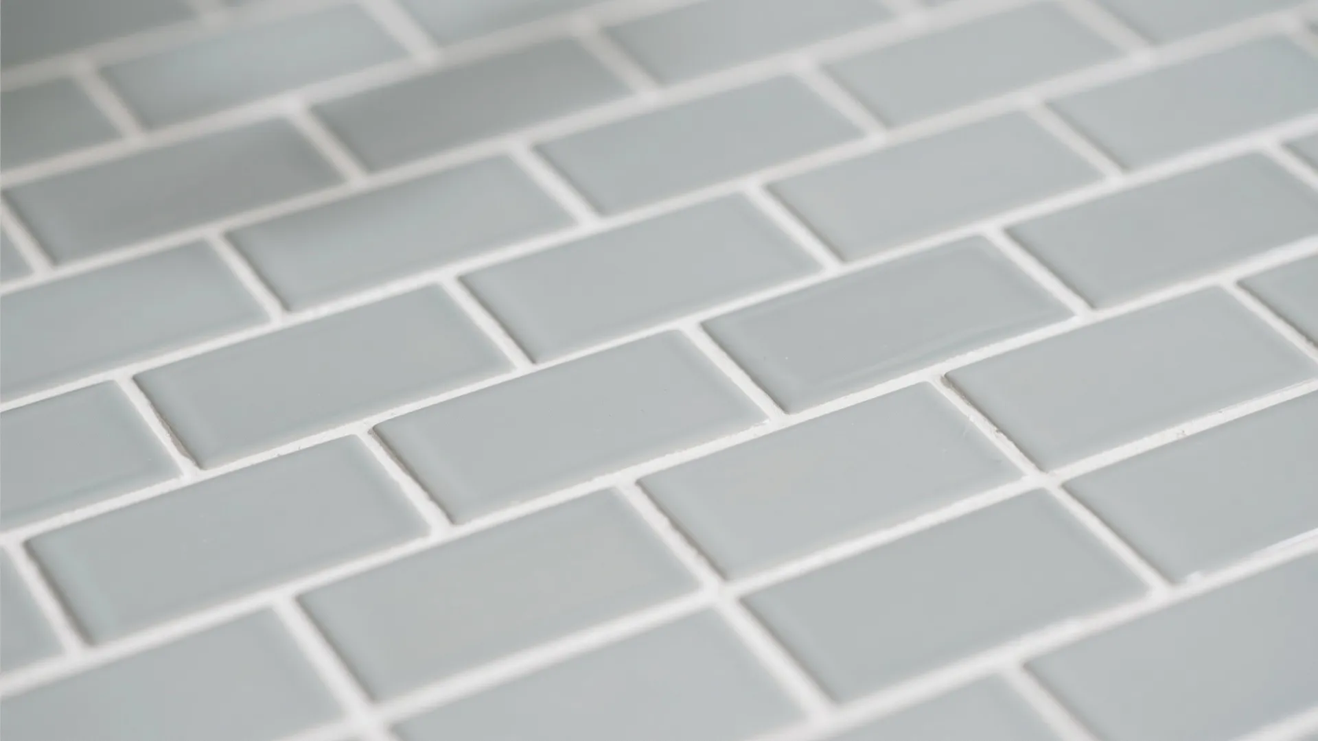 3. Light Gray Subway Tiles with White Grout