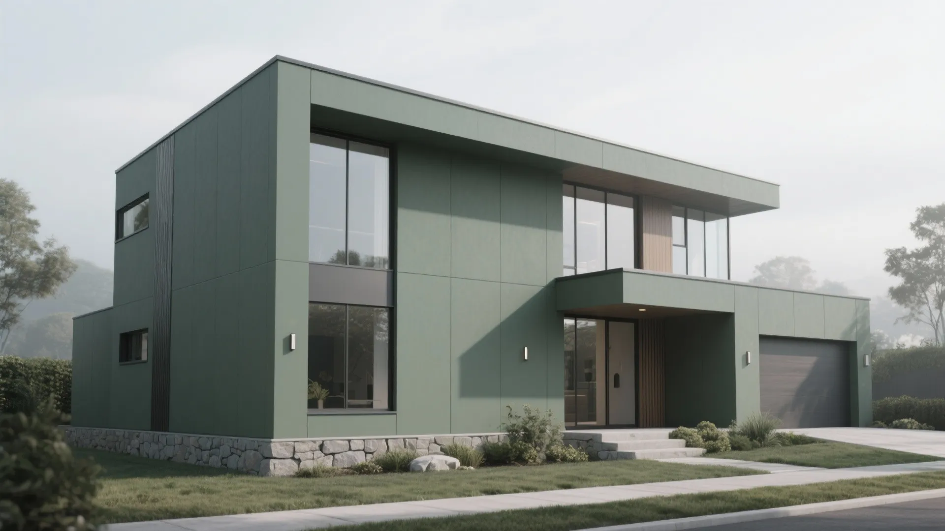 Modern minimalist house facade in a subdued green-gray with stone base and metal trim under soft daylight.