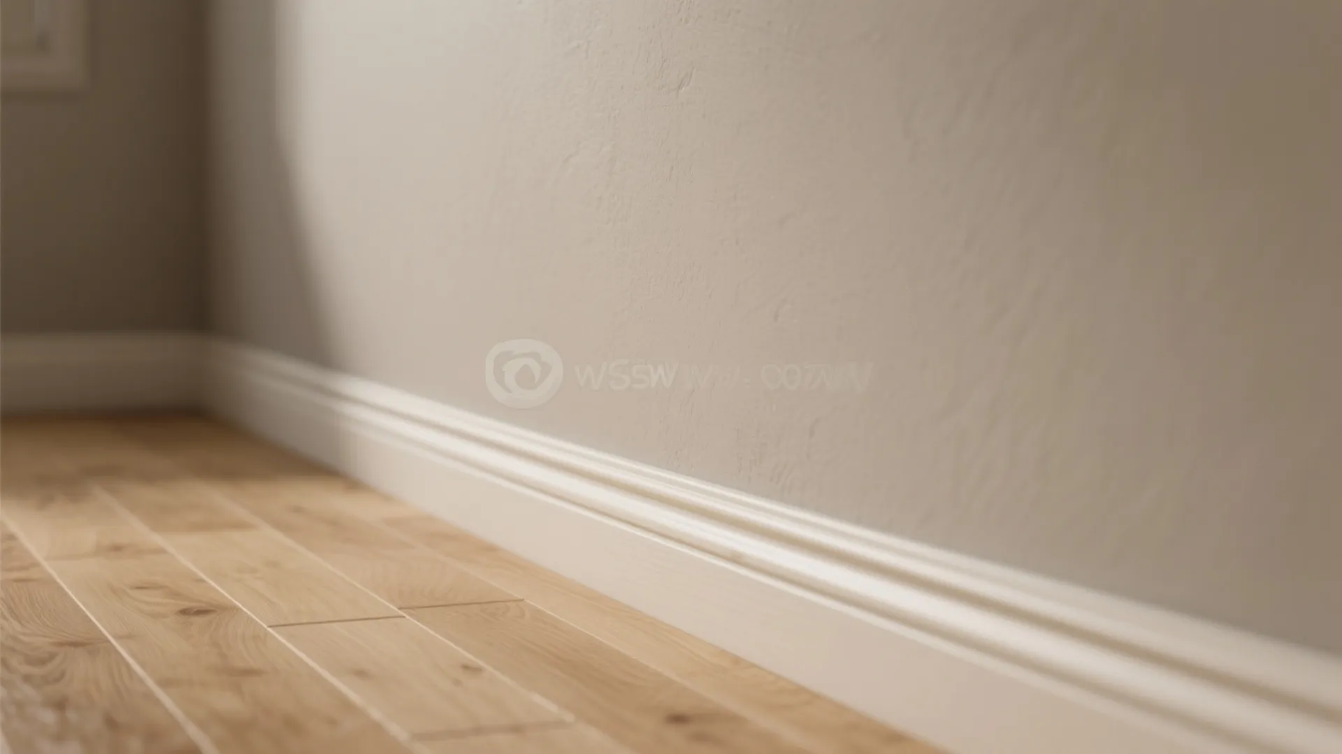 Close up of light beige wall textured paint with white wall panel and wooden floor
