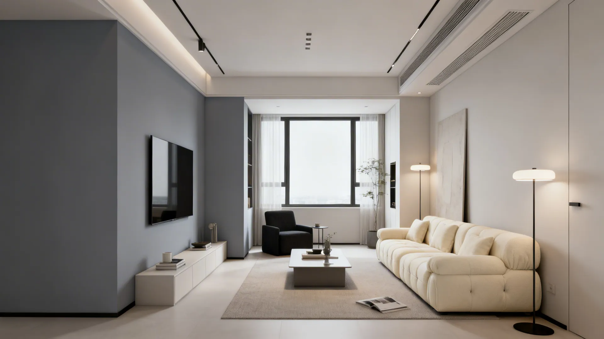 Modern living room with grey wall mounted television white sofa and floor lamps near window