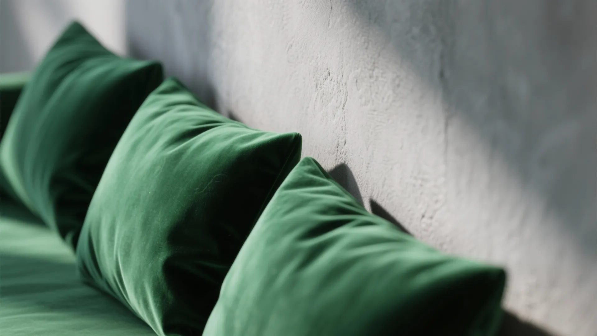 1. Layered Textures with Emerald Accents