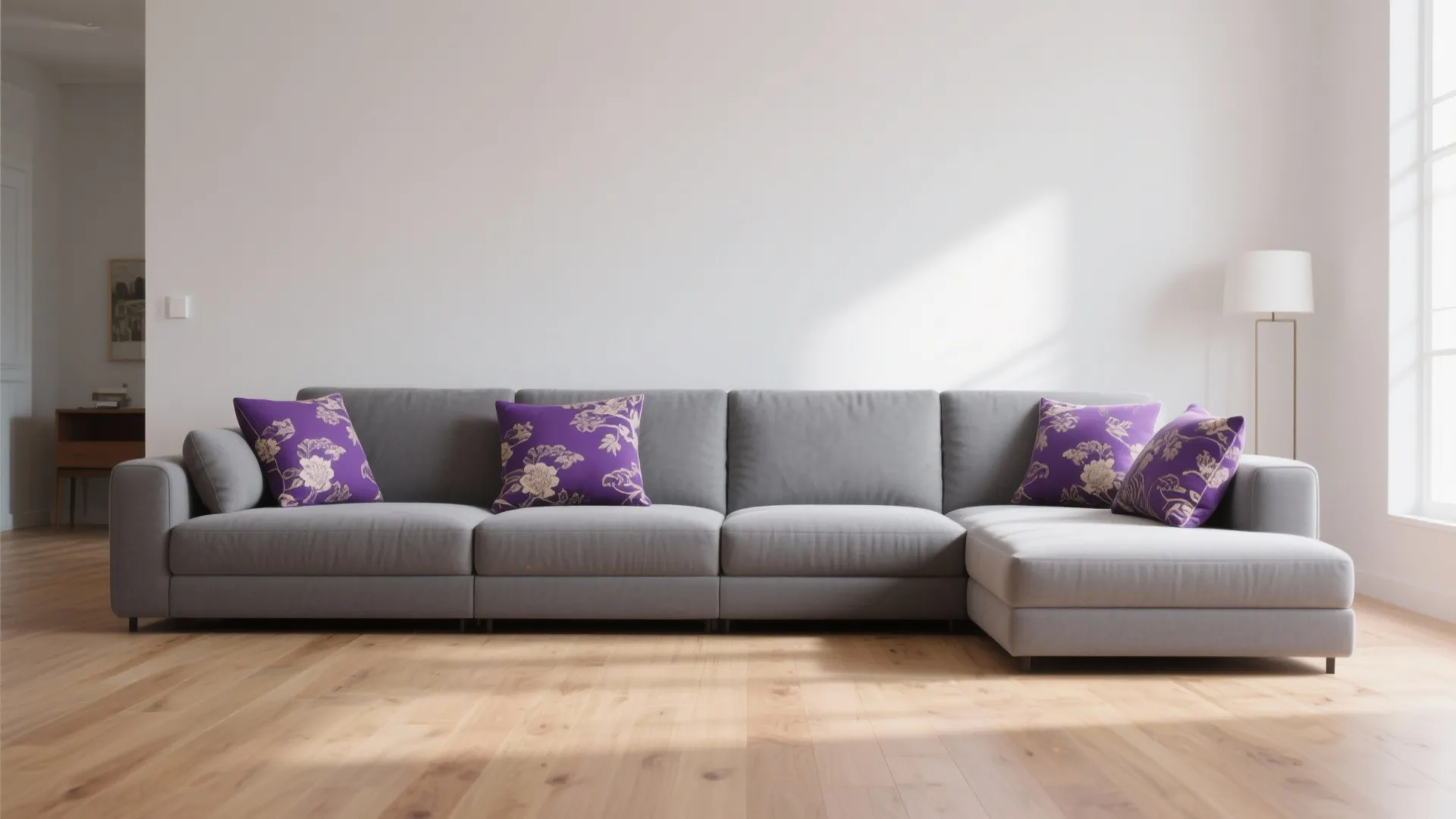 4. Grey Modular Sofa with Purple Patterned Cushions