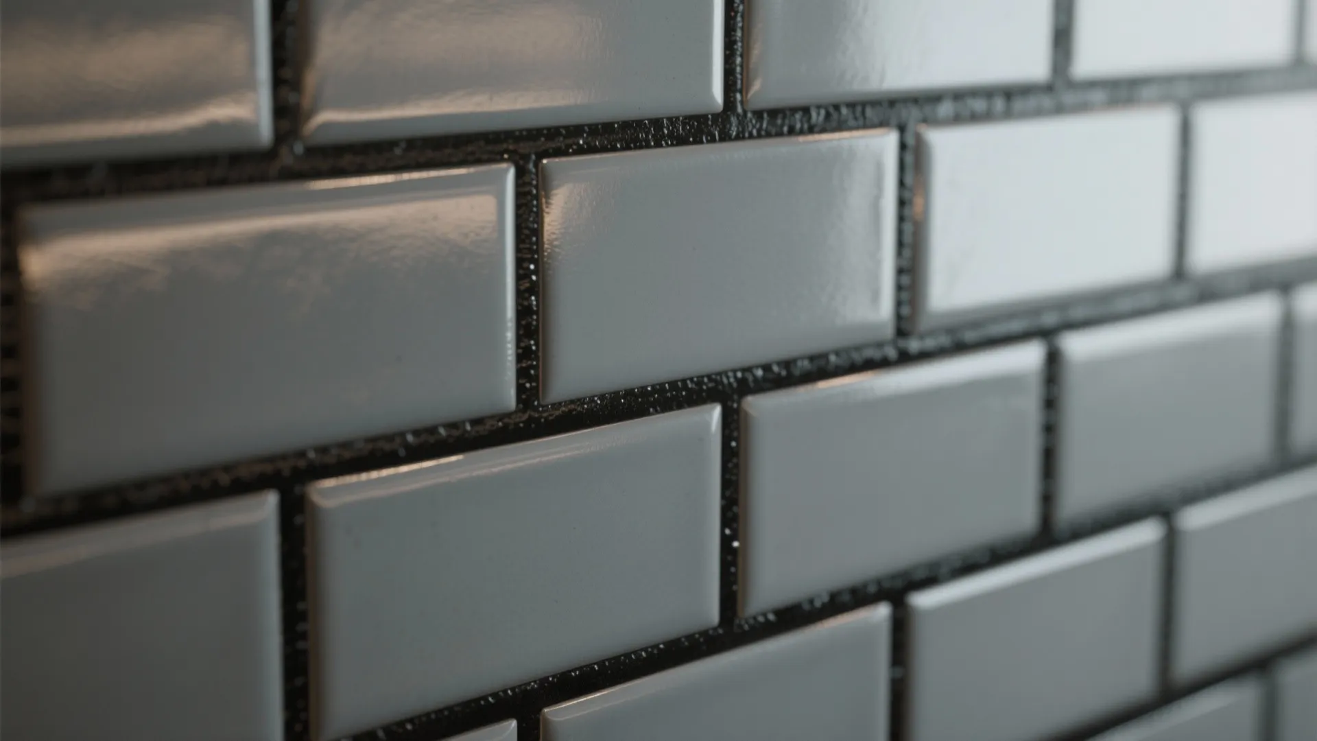 3. Grey tile backsplash with black grout