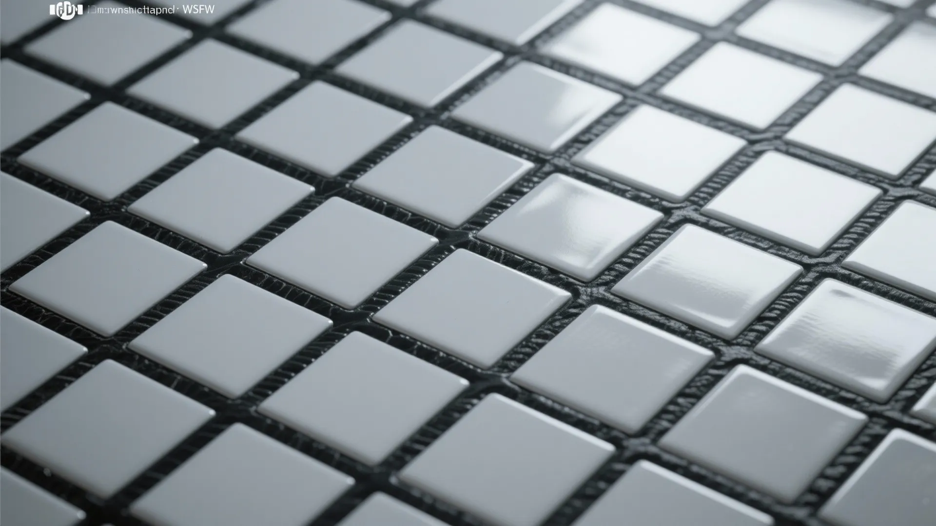 Close up view of small square white floor tiles with dark black grout lines pattern