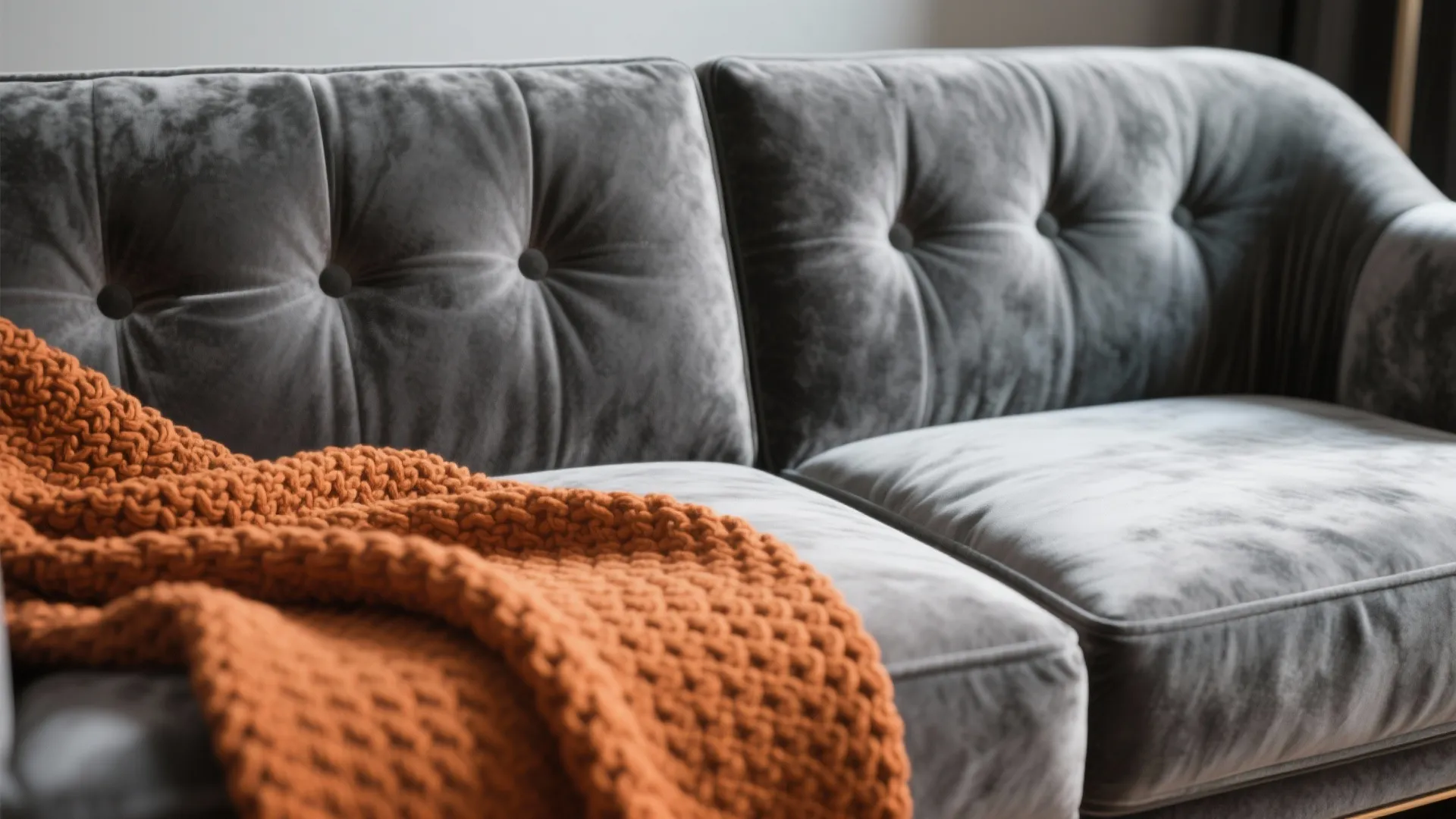 2. Grey Velvet Sofa with Orange Throw