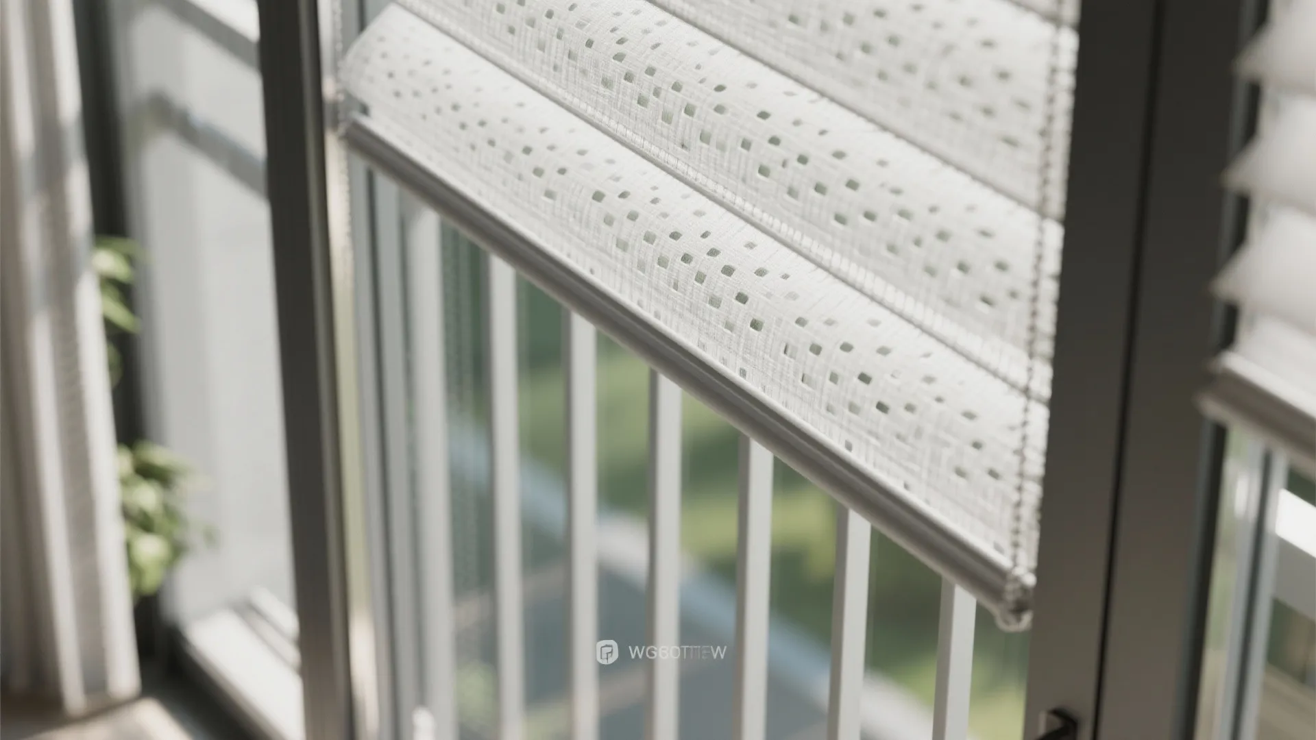 White fabric window blinds with small square patterns covering a glass door near a balcony