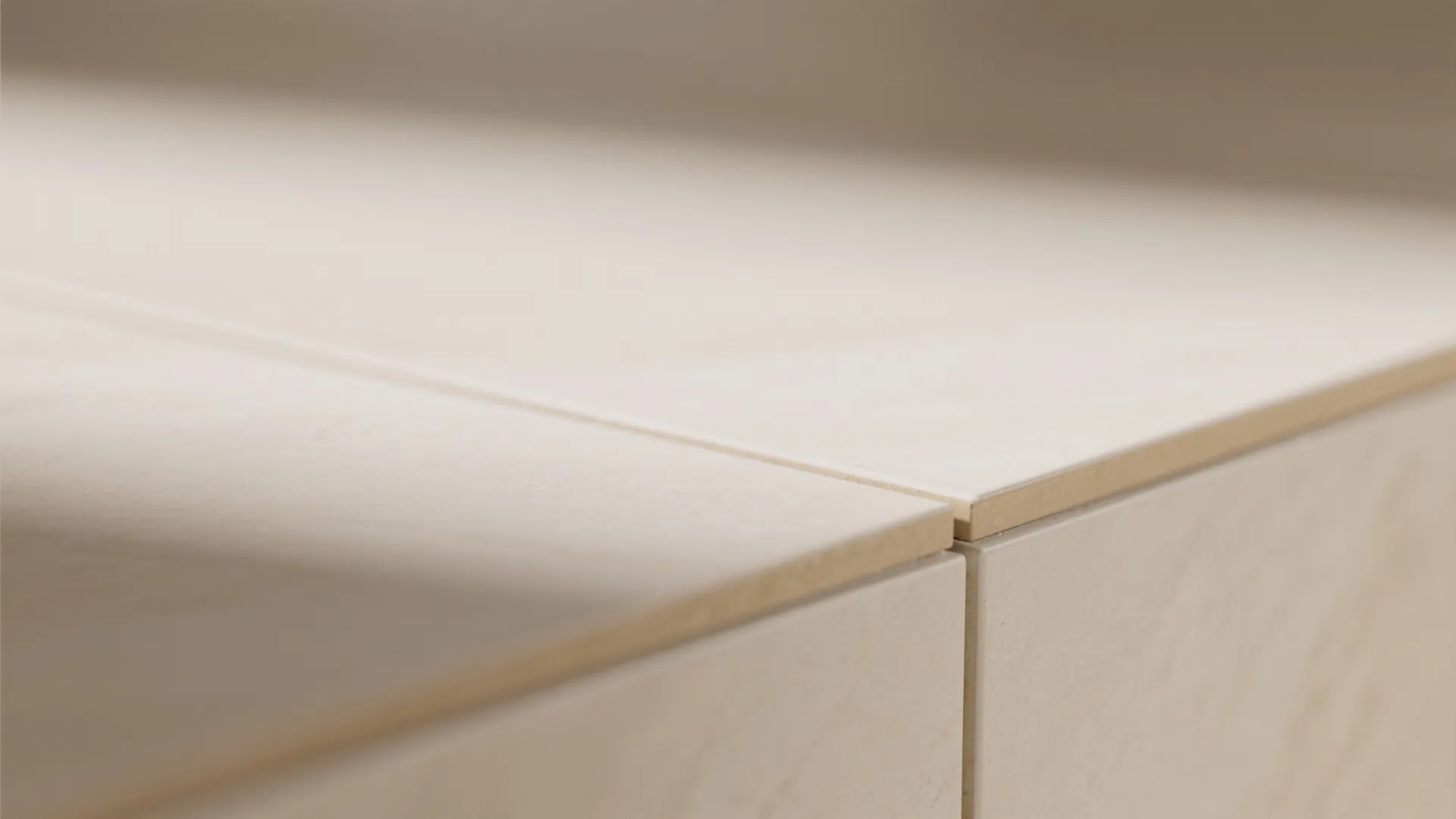 Light-toned large-format tiles for airy halls