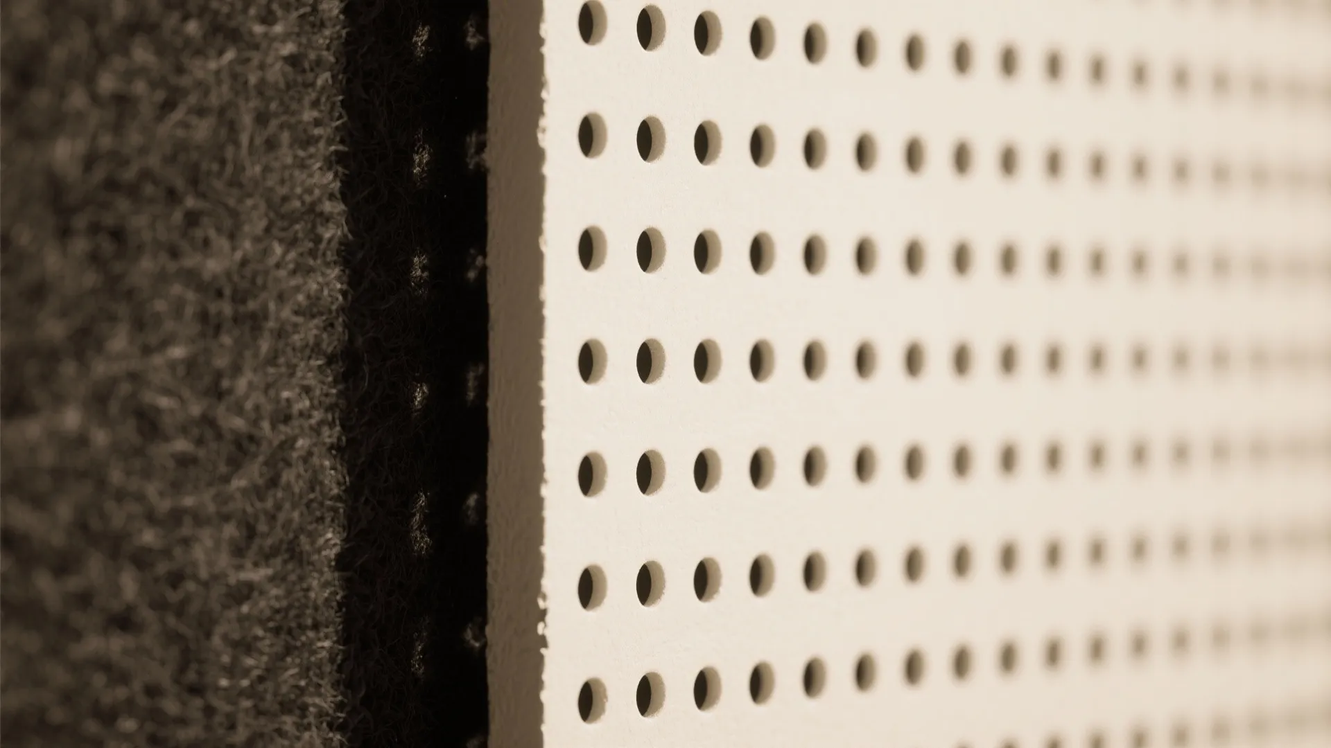 Perforated gypsum panels for acoustic calm