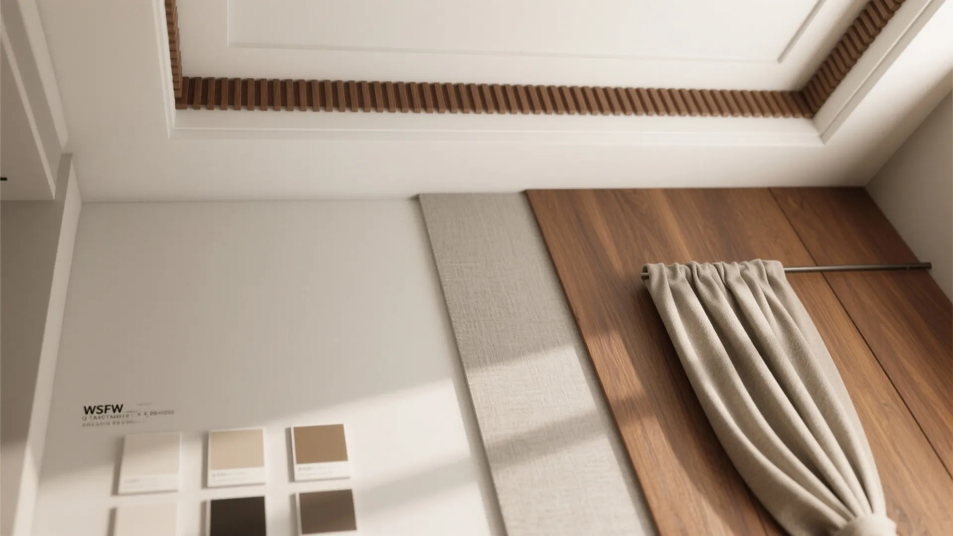 Close up view of white wall panels with wood texture and fabric material samples displayed