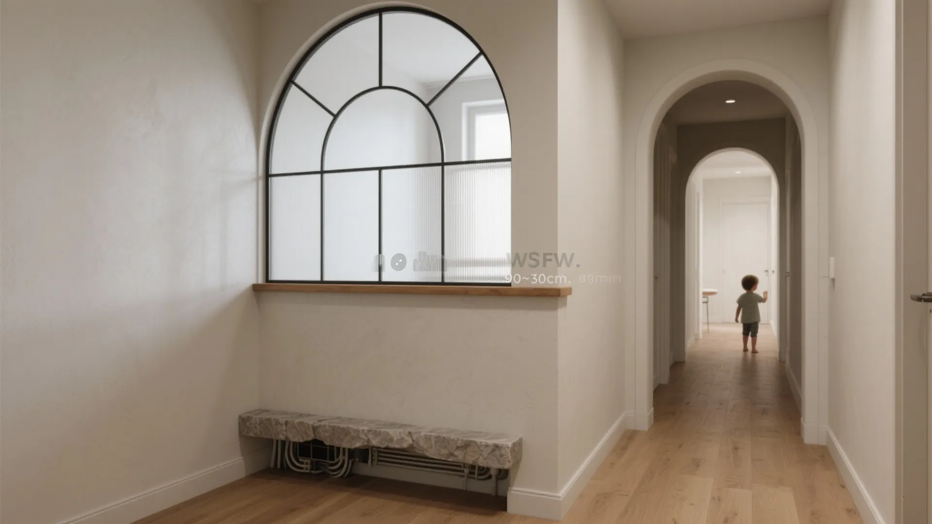 Interior hallway with arched glass window on half wall and arched doorway over wood floor