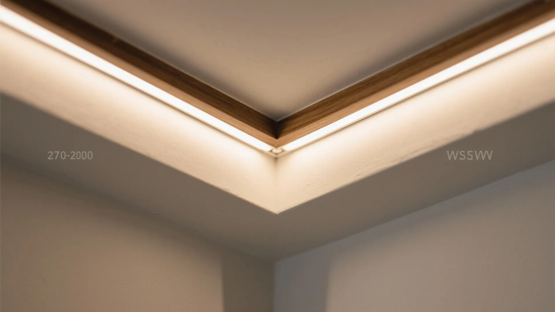 Close up of corner ceiling design with wood trim and bright hidden light fixture glow effect
