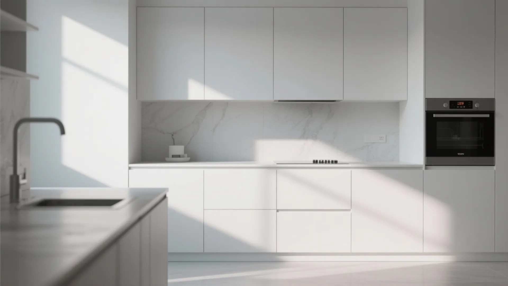 Minimalist white kitchen with handleless cabinets marble wall oven and bright sunlight on the counter