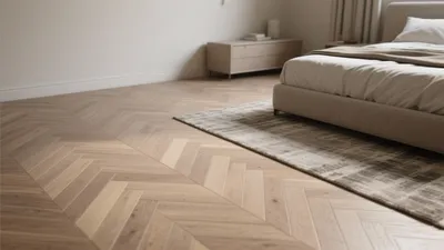 Serene Bedroom with Herringbone Wood Flooring