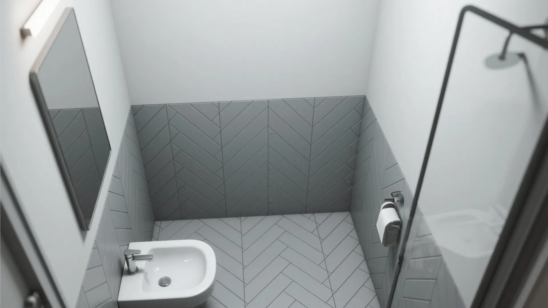 Top view of small bathroom with grey patterned wall tiles white sink mirror and shower head