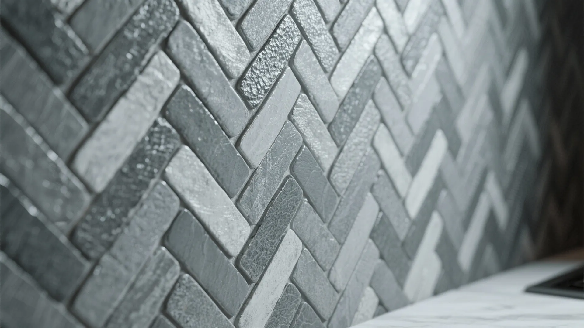 3. Herringbone grey mosaic to add motion