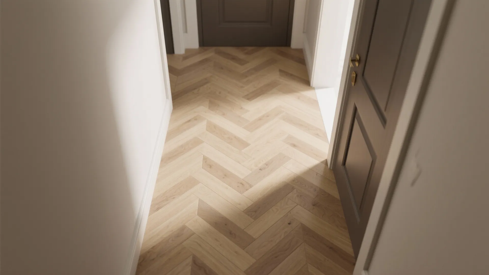 Modern hallway featuring light wood herringbone patterned flooring, white walls, and dark brown wooden door