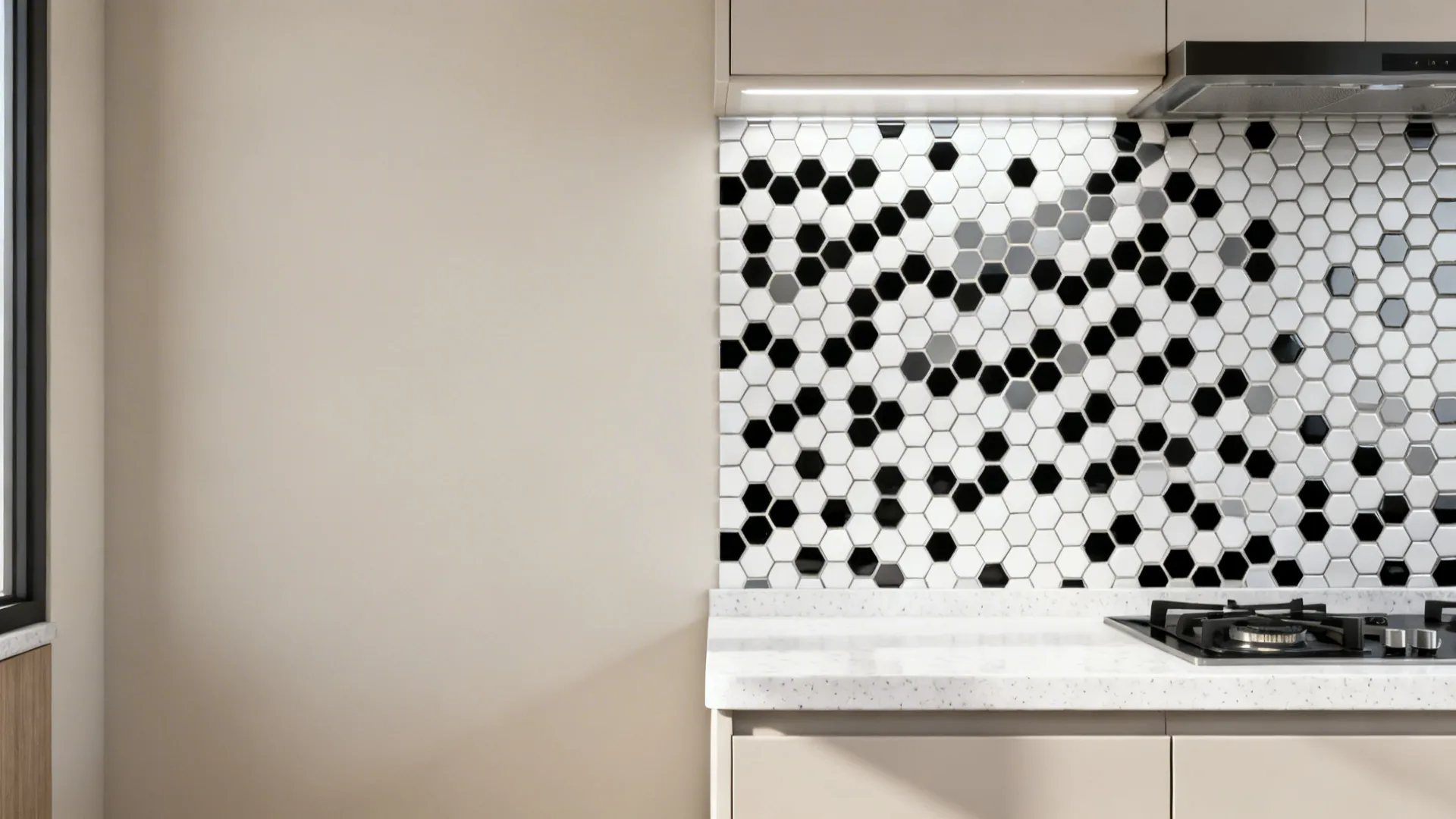 Before-and-after of a small kitchen wall showing plain paint versus a black-and-white hex mosaic.