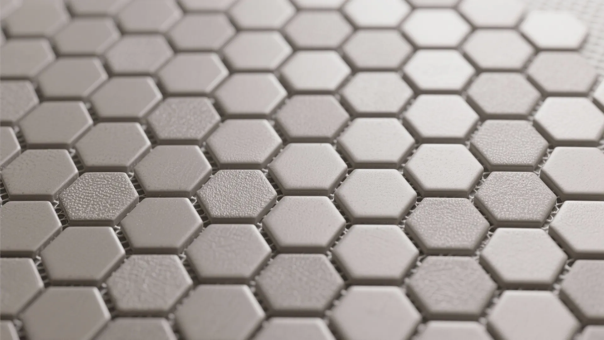 3) Monochrome micro-mosaic floors with anti-slip