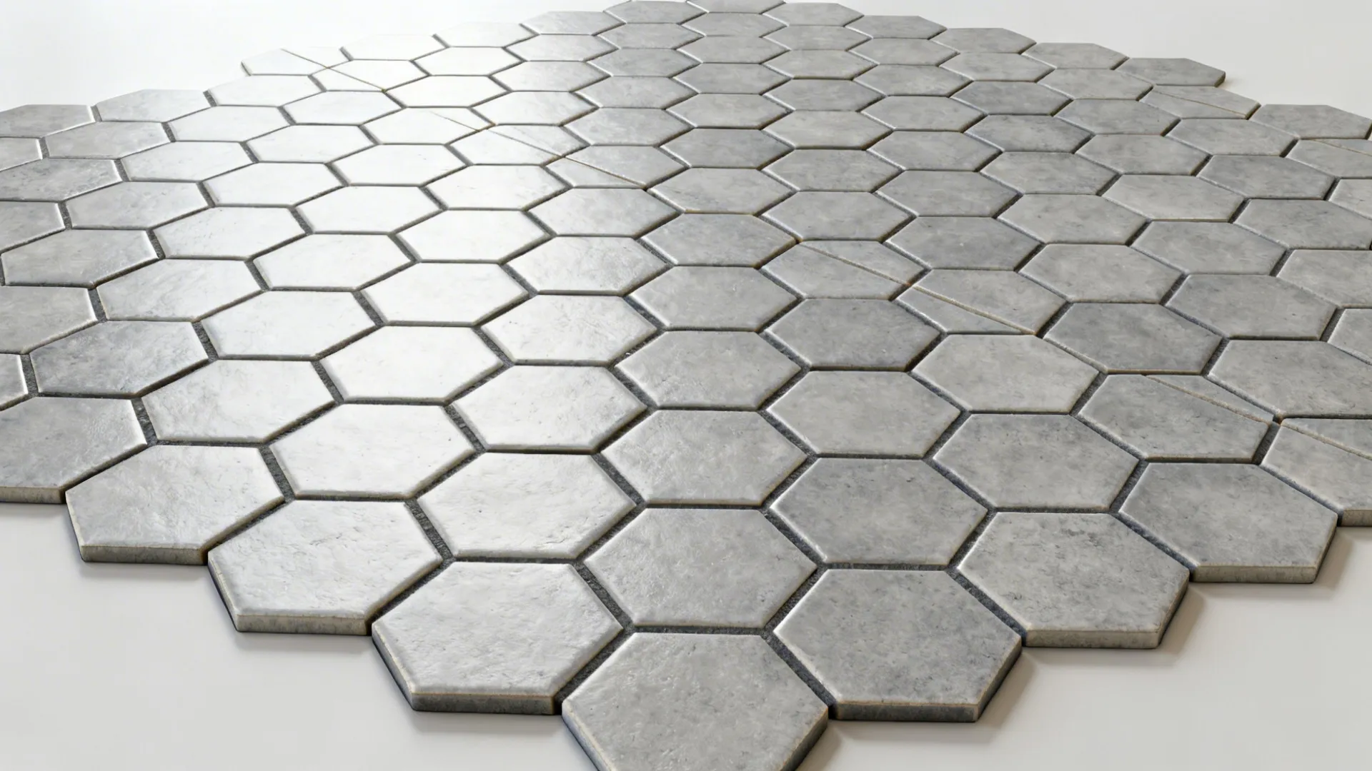 Top-down view of gray hex mosaic sheets aligned with even joints and darker grout plan.