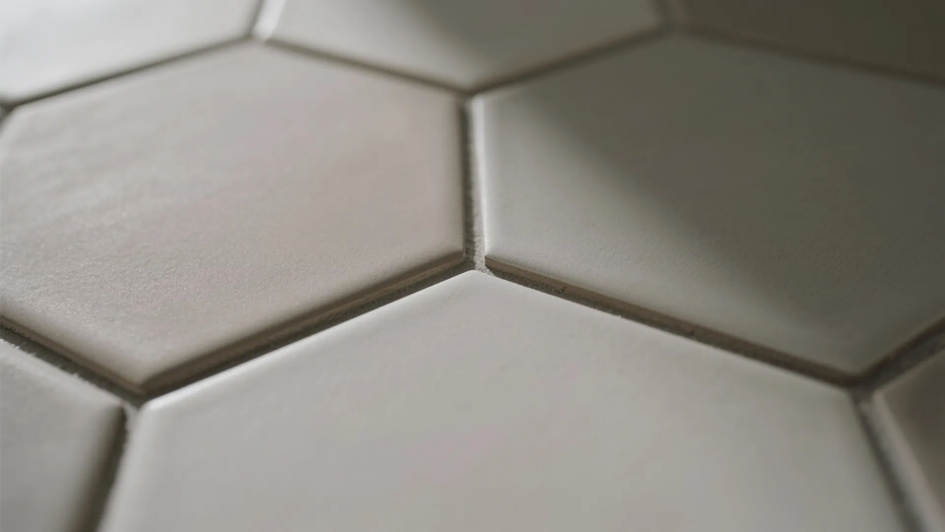 3) Matte hex tile floors with color-blocked zones