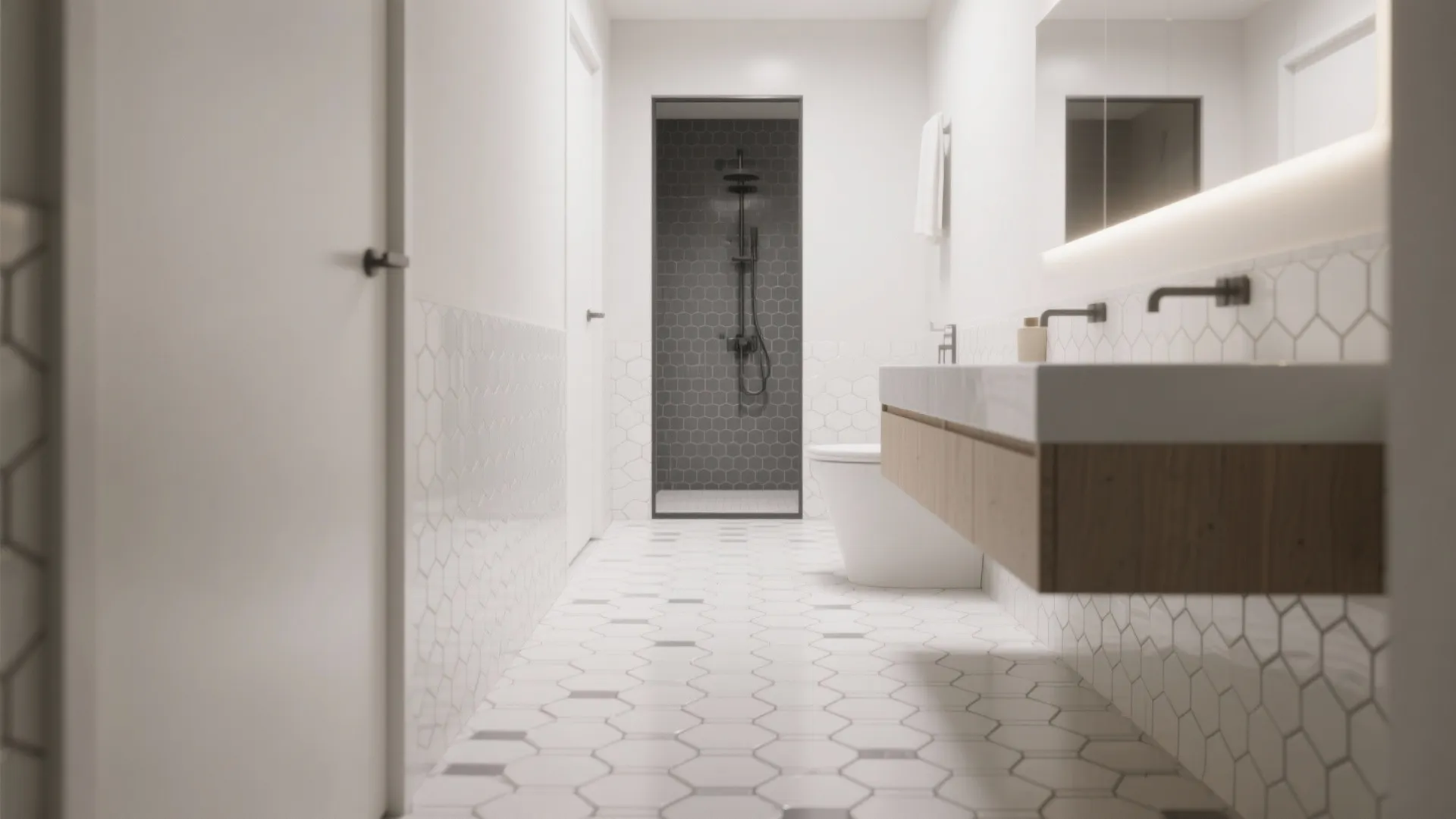 Narrow bath with small hex mosaic floor guiding the eye toward the shower zone.