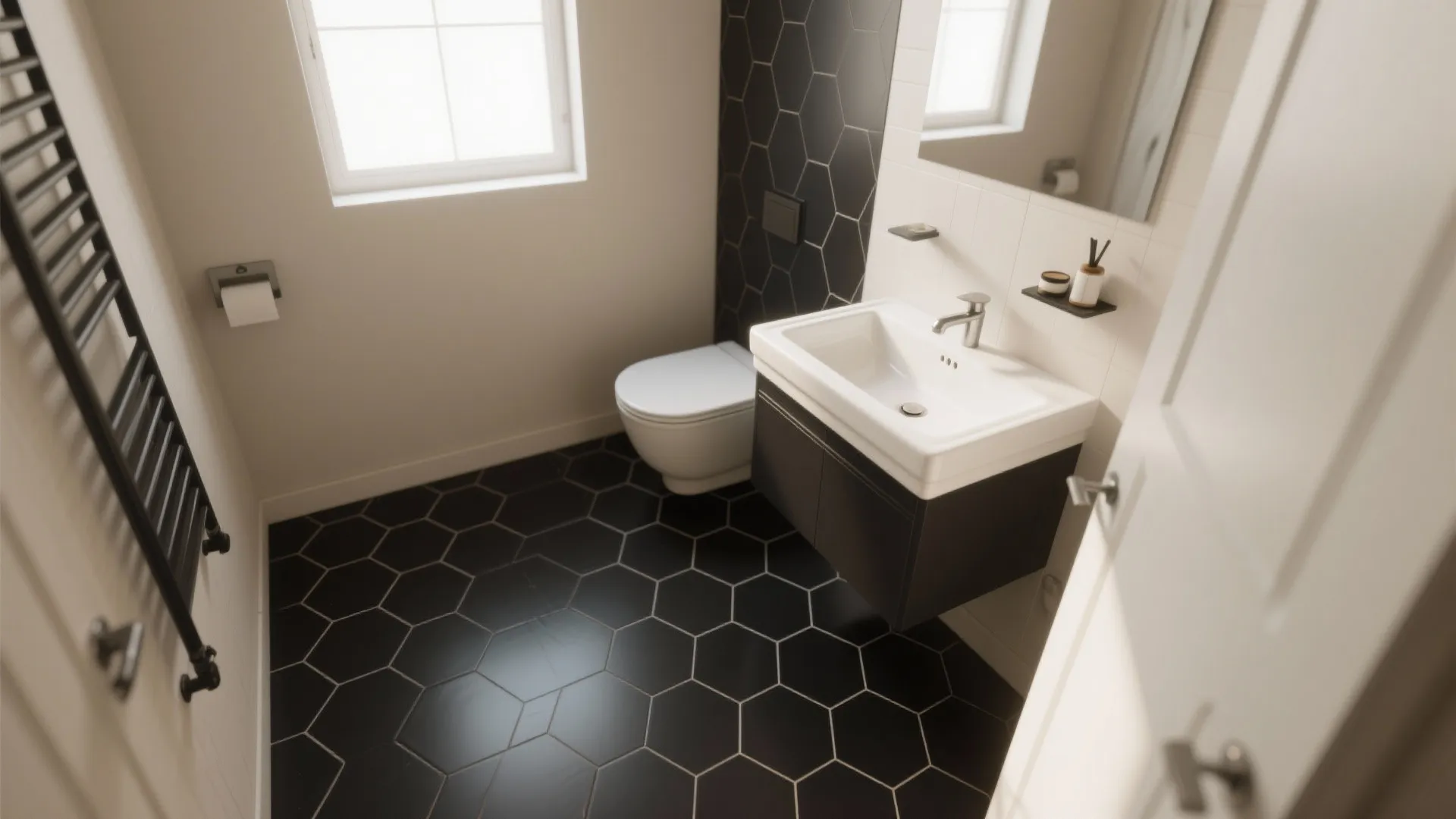 Small bathroom featuring black hexagon floor tiles white walls floating sink toilet and bright window
