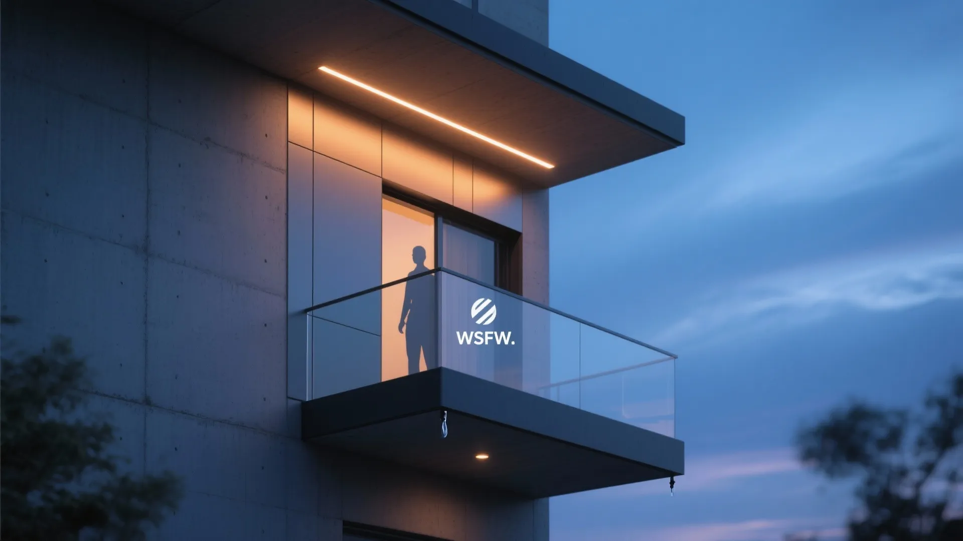 Modern apartment balcony with glass railing and warm light fixture on the ceiling at night