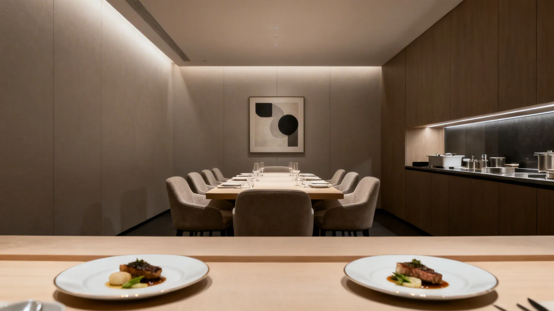 Sleek modern private dining room with neutral palette and subtle art.