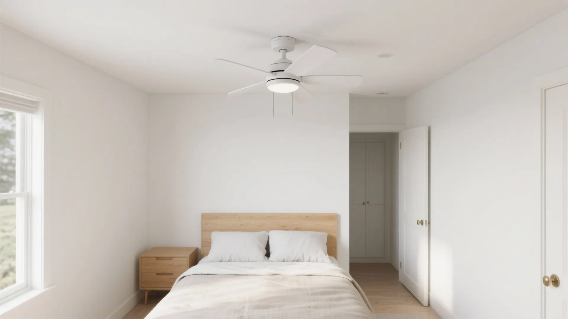 Modern white ceiling fan with light fixture in minimalist bedroom featuring wooden bed and white walls