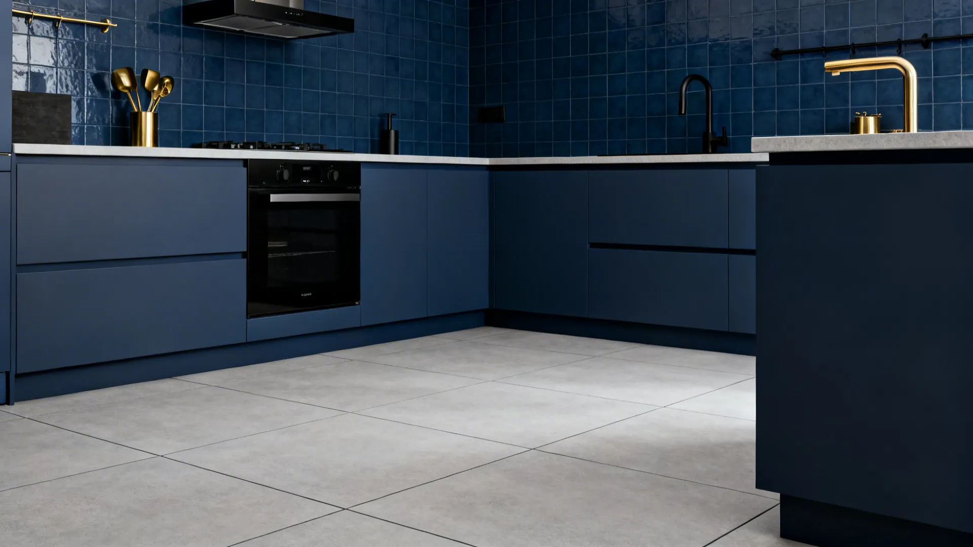 Ink blue ceramic walls with light gray large-format floor tiles in a modern kitchen.