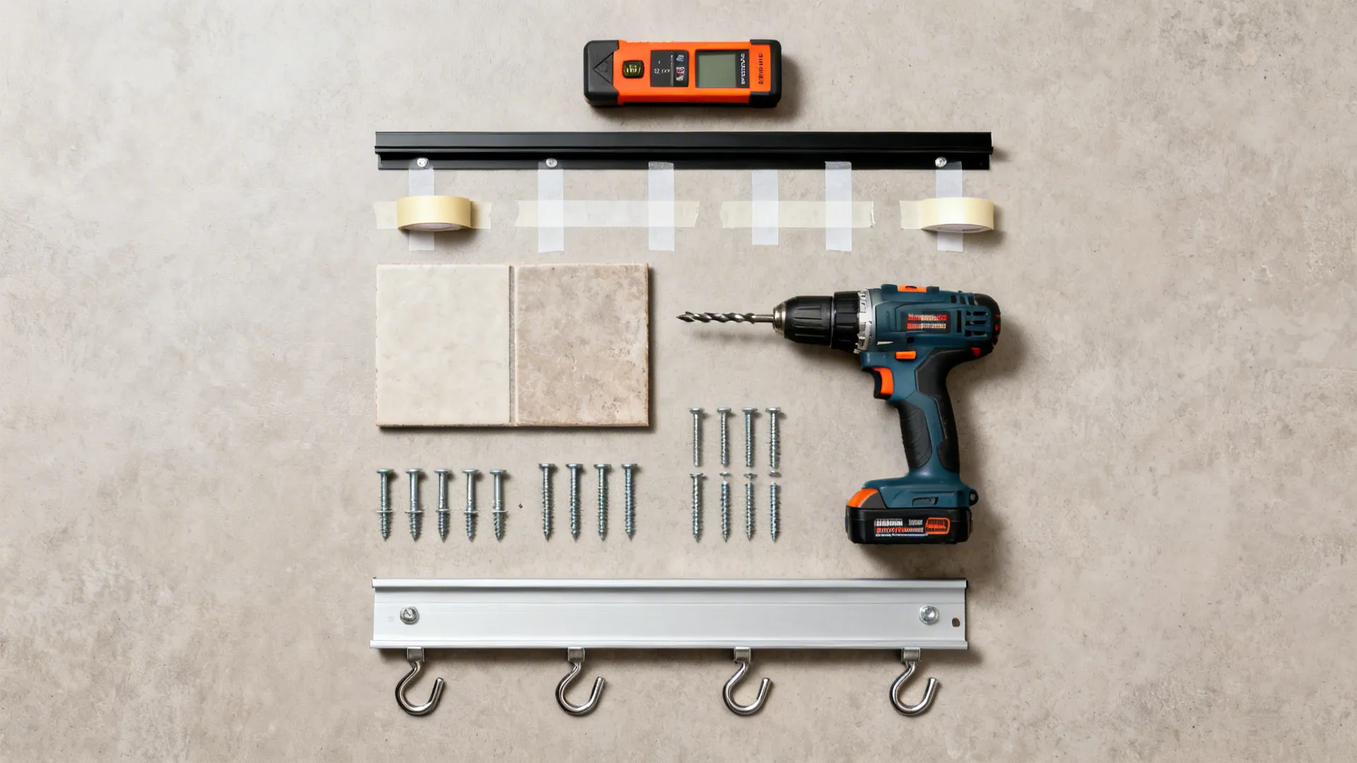 Top-down layout of tools and anchors for installing kitchen hooks and rails.