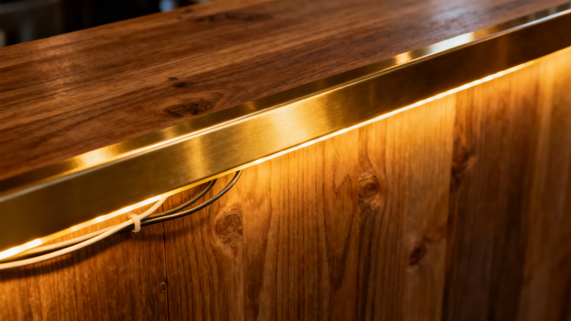 Edge-lit pass-through window showing LED strip lighting and decorative trim.