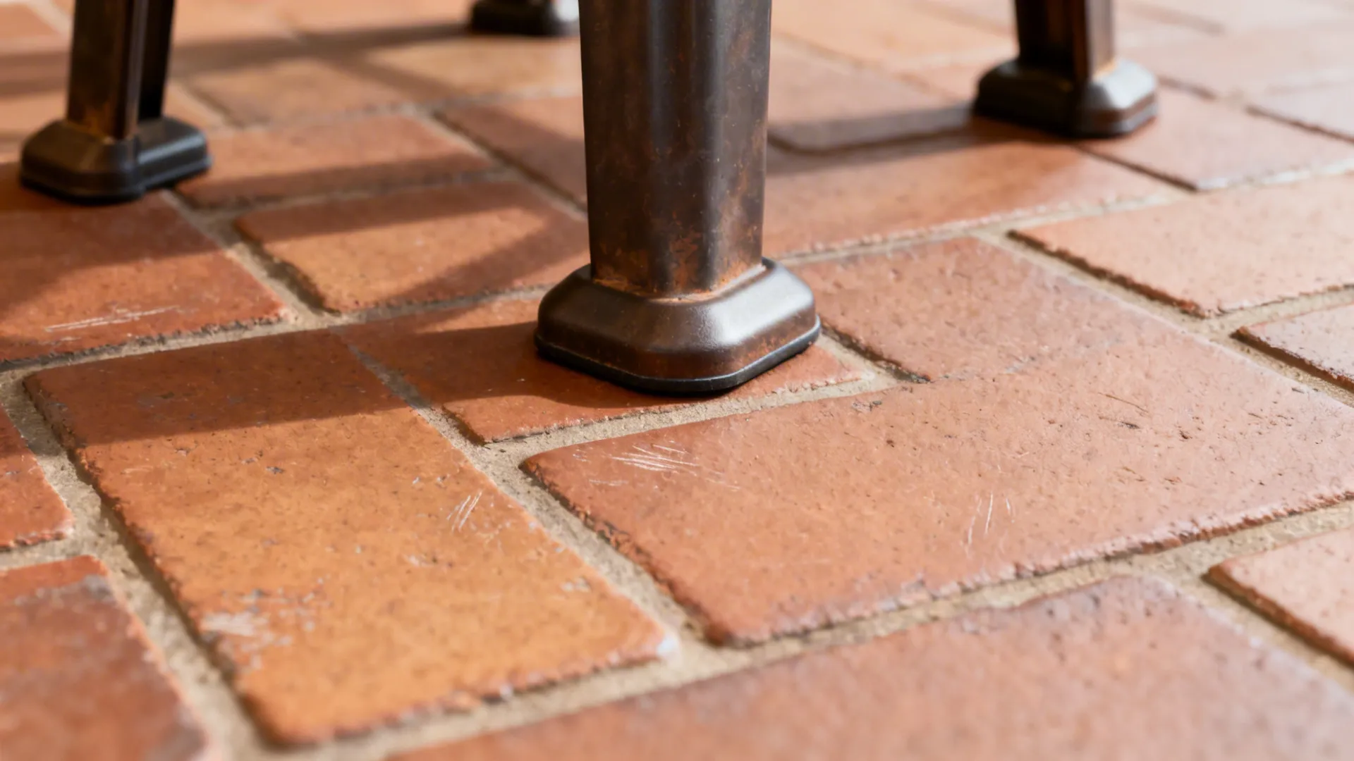 Macro of matte-sealed brick on an island face with eased edges for durability.