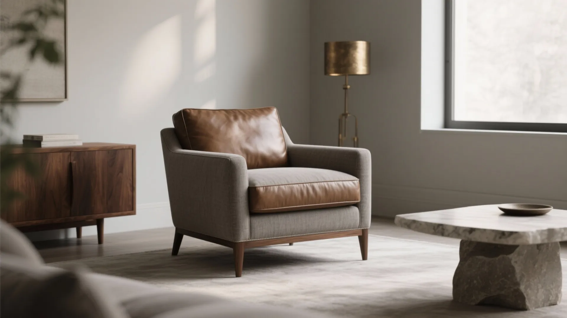 A single heirloom-quality seat anchors a compact living room in warm neutrals and wood accents.