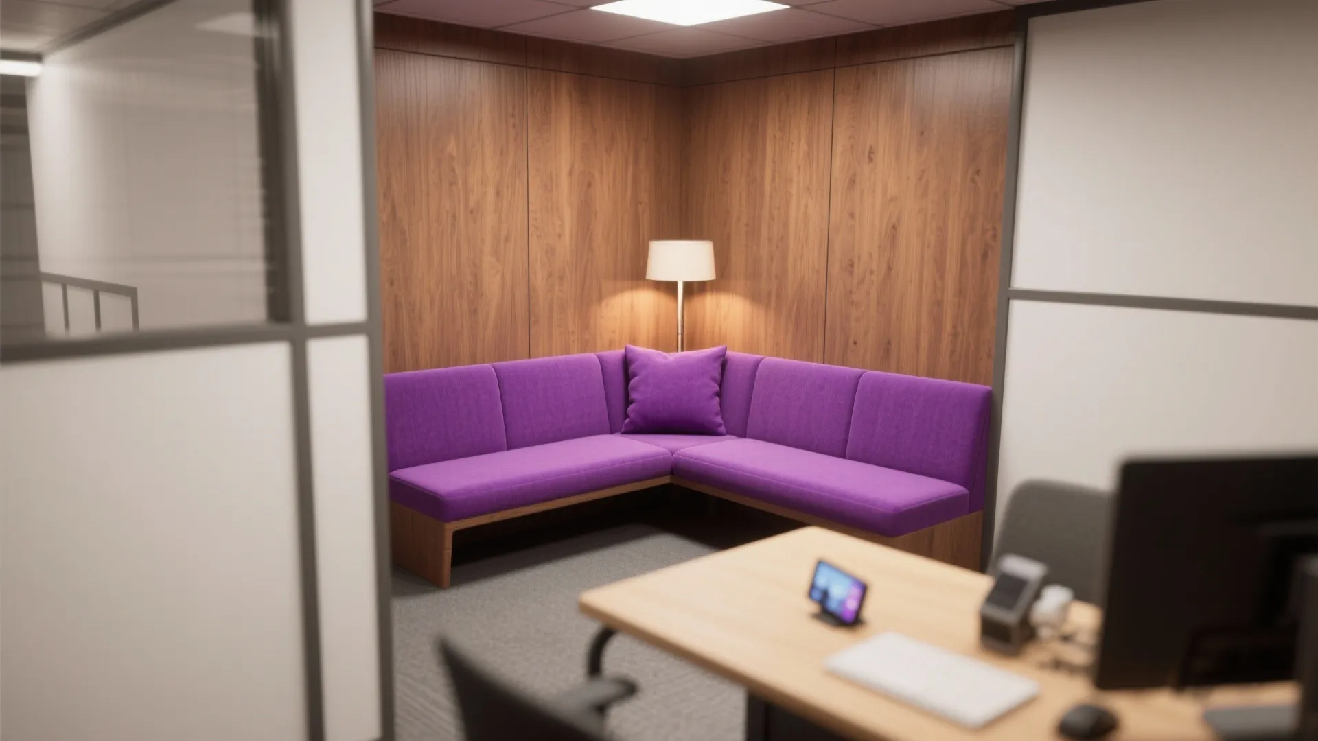 Purple corner sofa against wood walls with a floor lamp in a small office nook