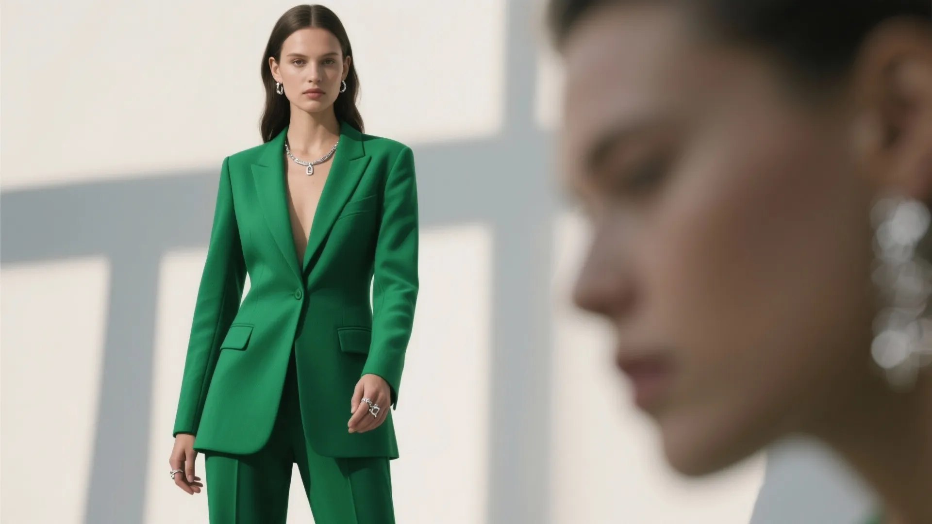 9. Jewel-Toned Suit with Minimalist Jewelry