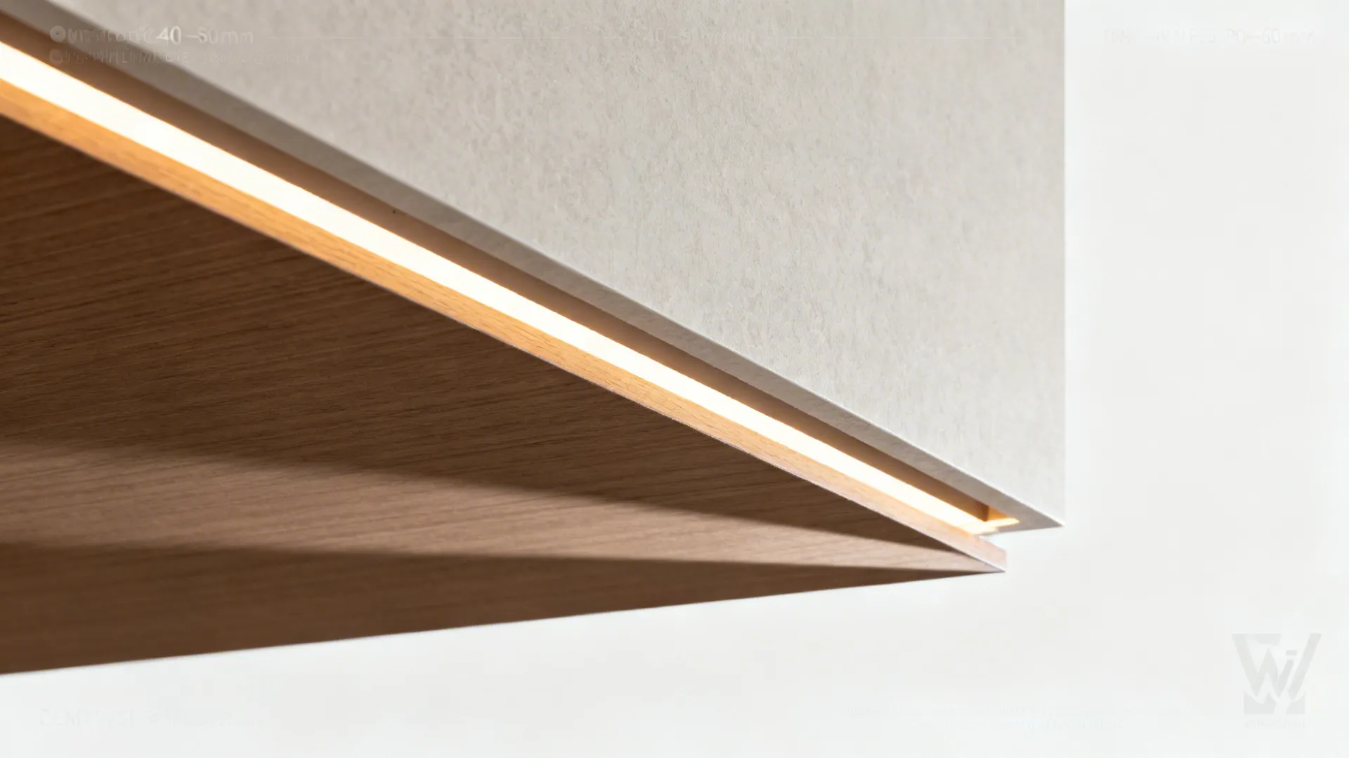 Macro of a knife-edge ceiling panel with soft integrated lighting.