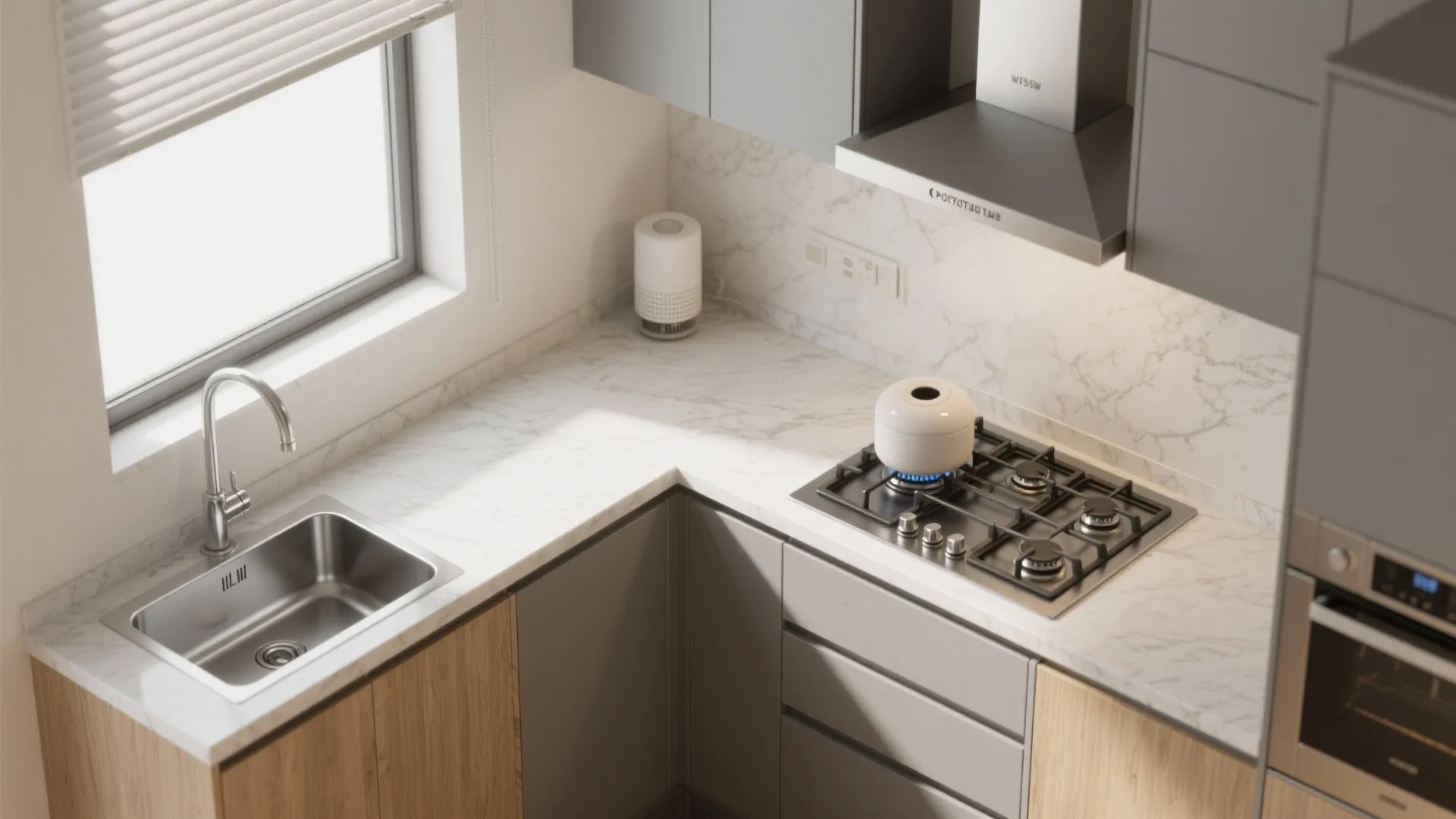 Top-down view of an L-shaped compact kitchen with a diffuser placed in a calm corner.