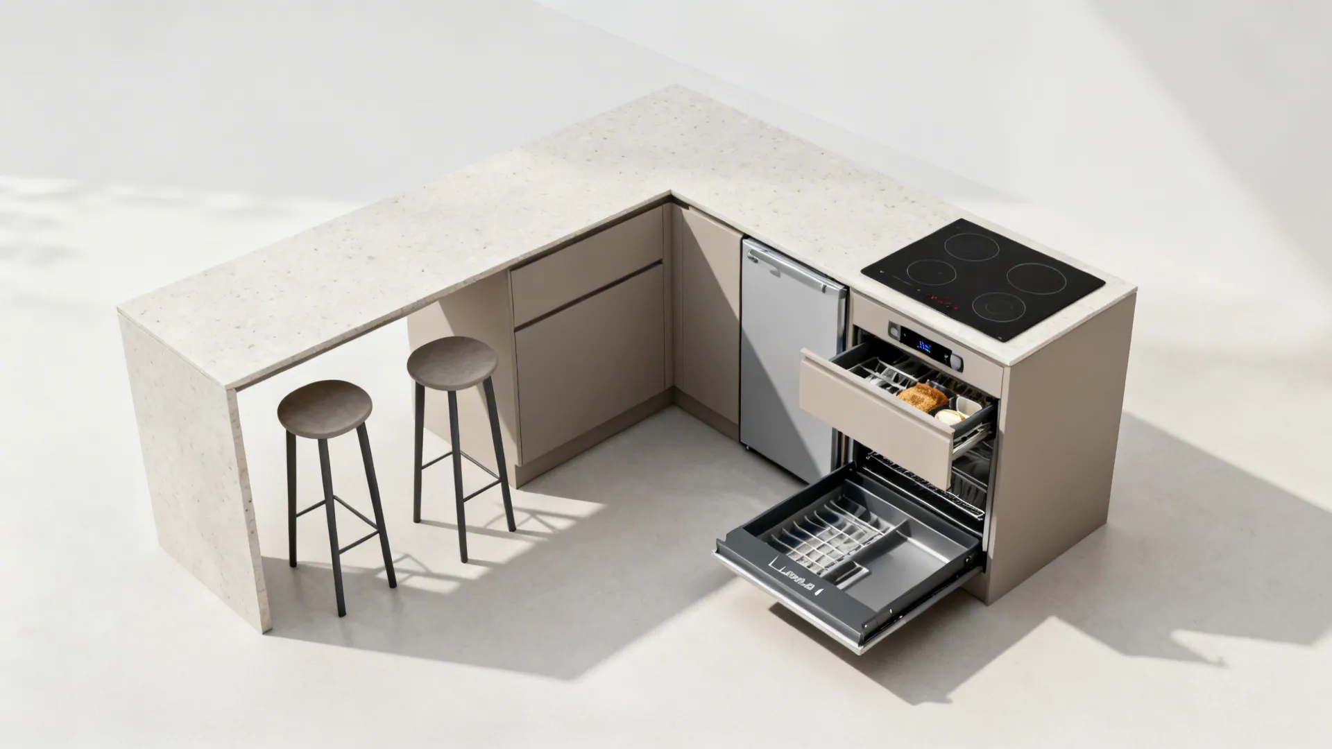 Compact L-shaped kitchen with a clear landing zone and a small breakfast overhang.