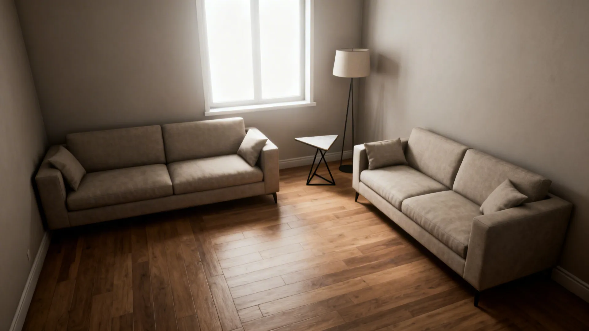 L-shaped couch and loveseat against two walls with a styled corner table and lamp