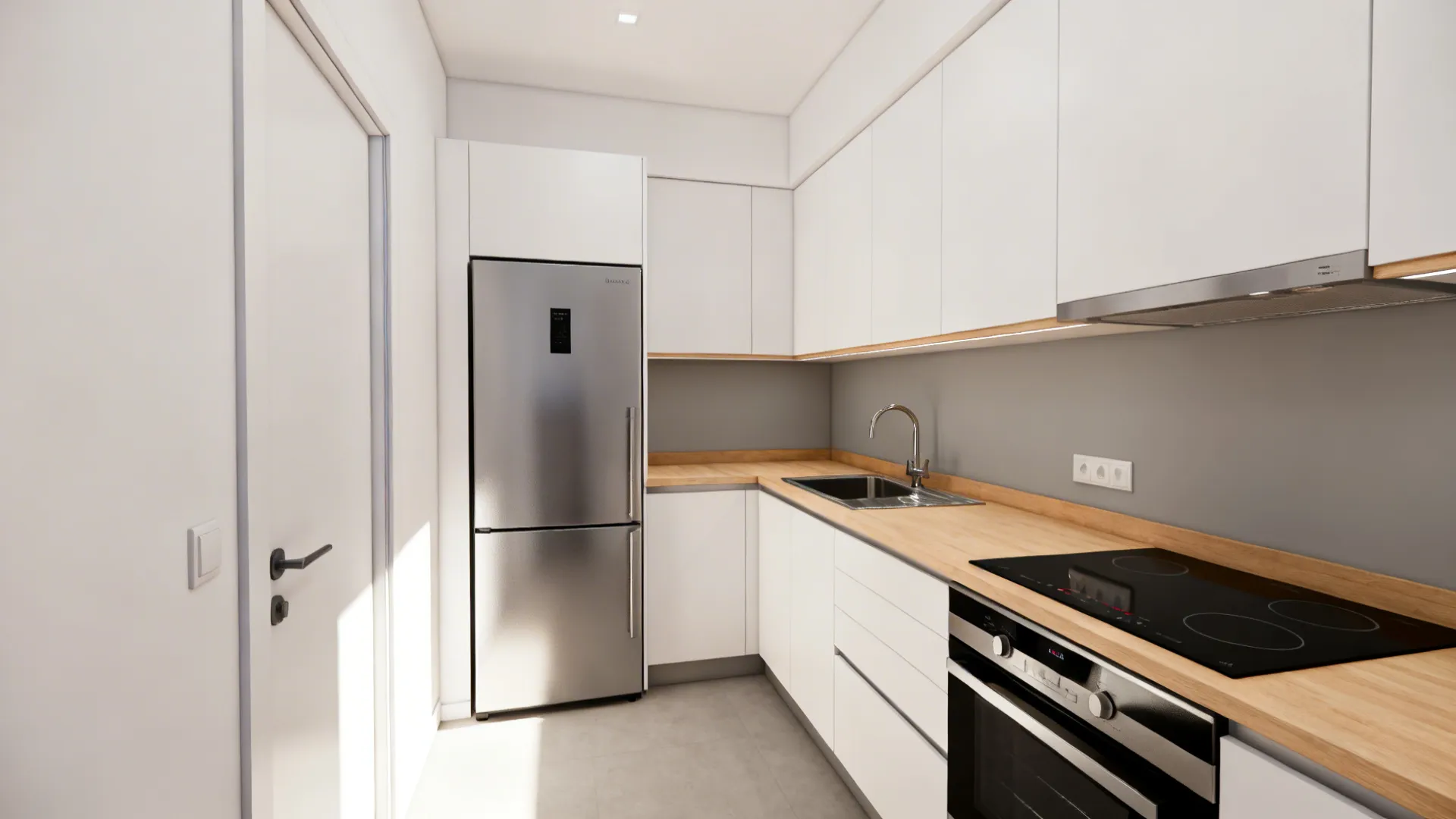 Small L-shaped kitchen with clear walkway and continuous prep zone by the sink.