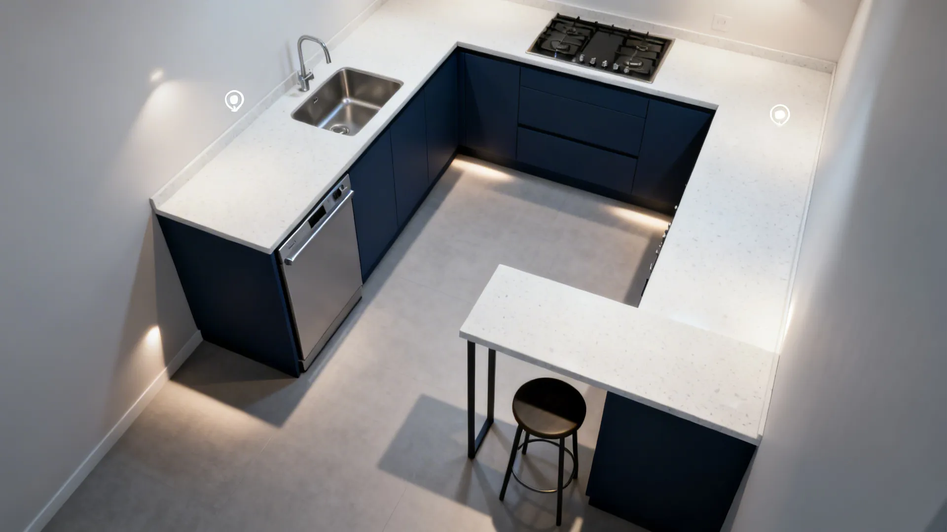 Top-down view of a compact L-shaped kitchen with navy bases and clear work triangle.