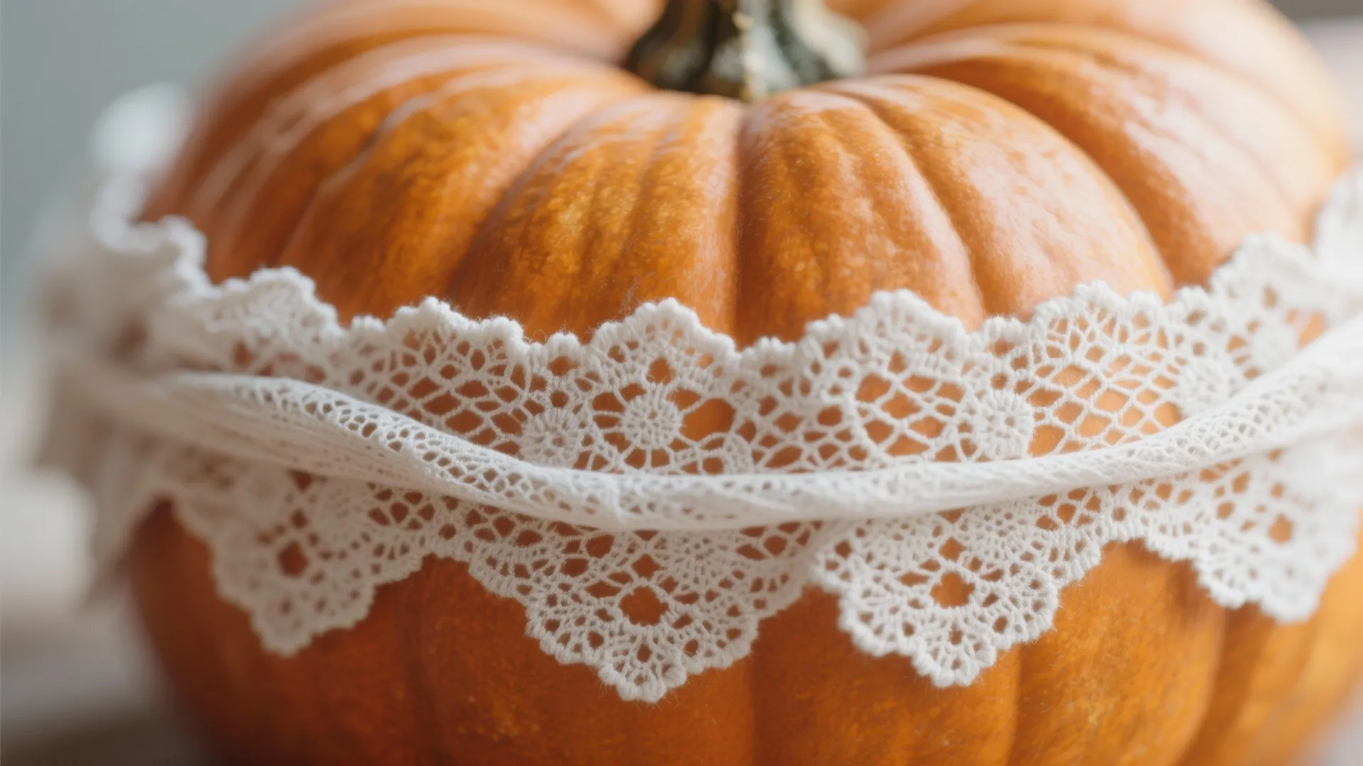 Pumpkin wrapped delicately with white lace fabric