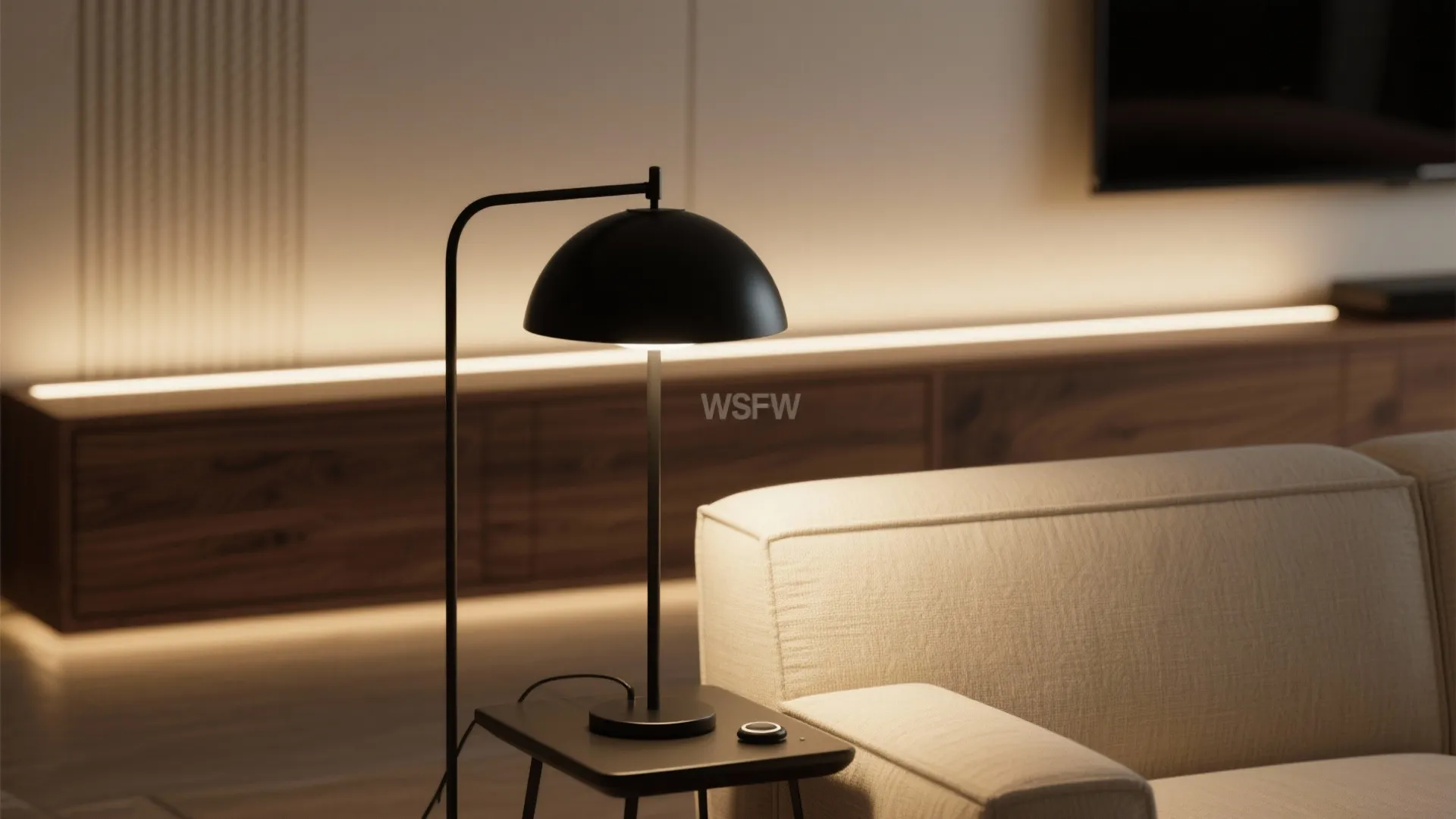 Modern black desk lamp on small table next to sofa with warm backlight and wood cabinet