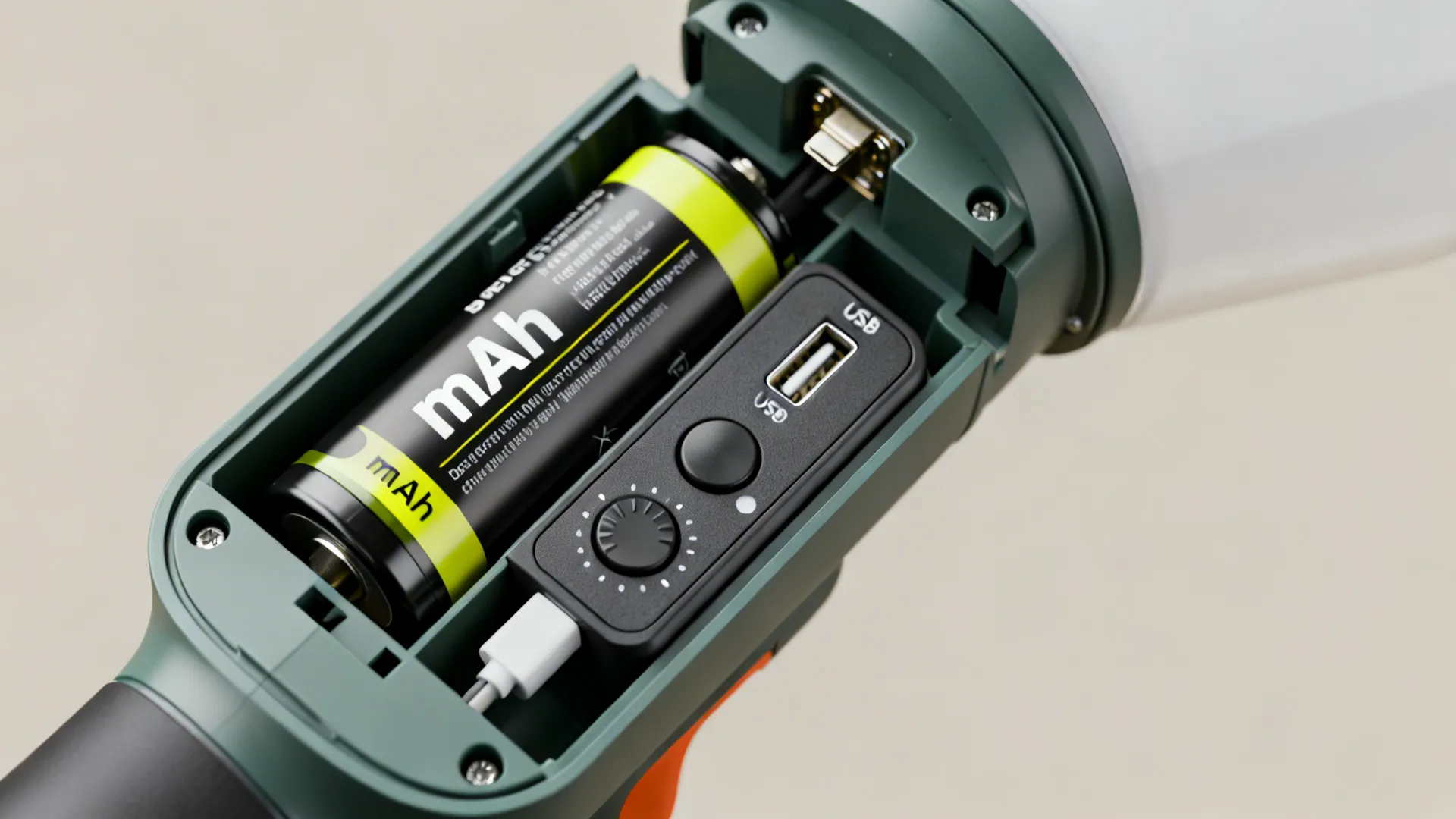 Macro view of a cordless lamp's removable battery, dimmer controls and USB port for troubleshooting and specs.