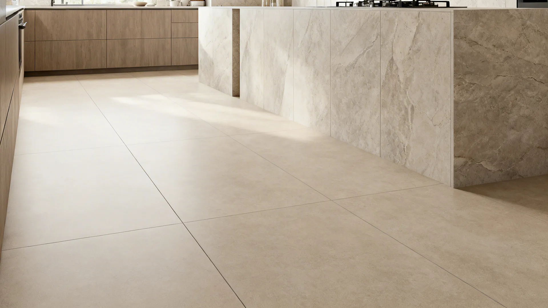 Large-format 600x1200 mm porcelain tiles with minimal grout in a compact galley kitchen.
