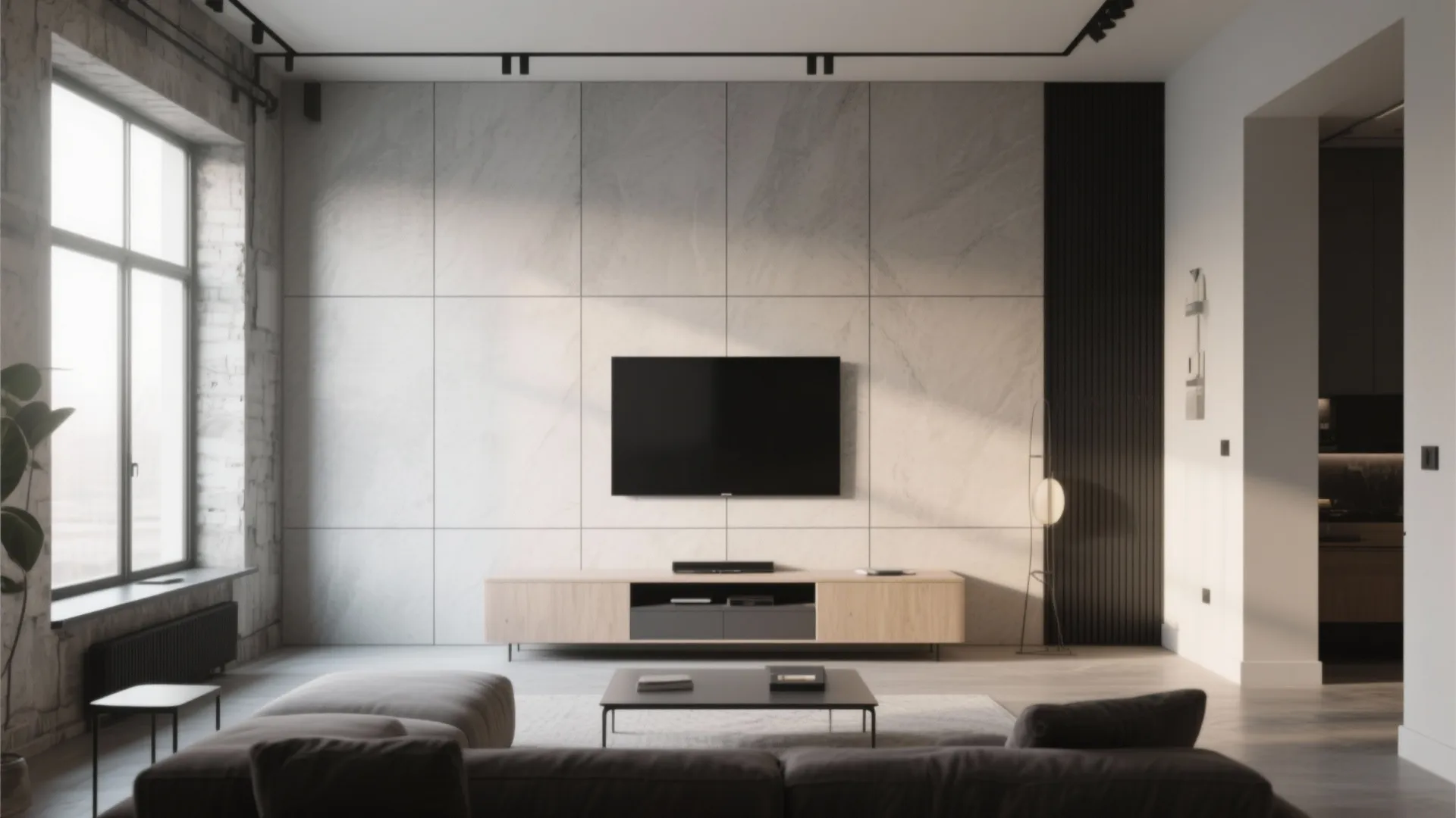 Large-format porcelain panel wall in a compact living room with minimal grout lines for a seamless, airy look.