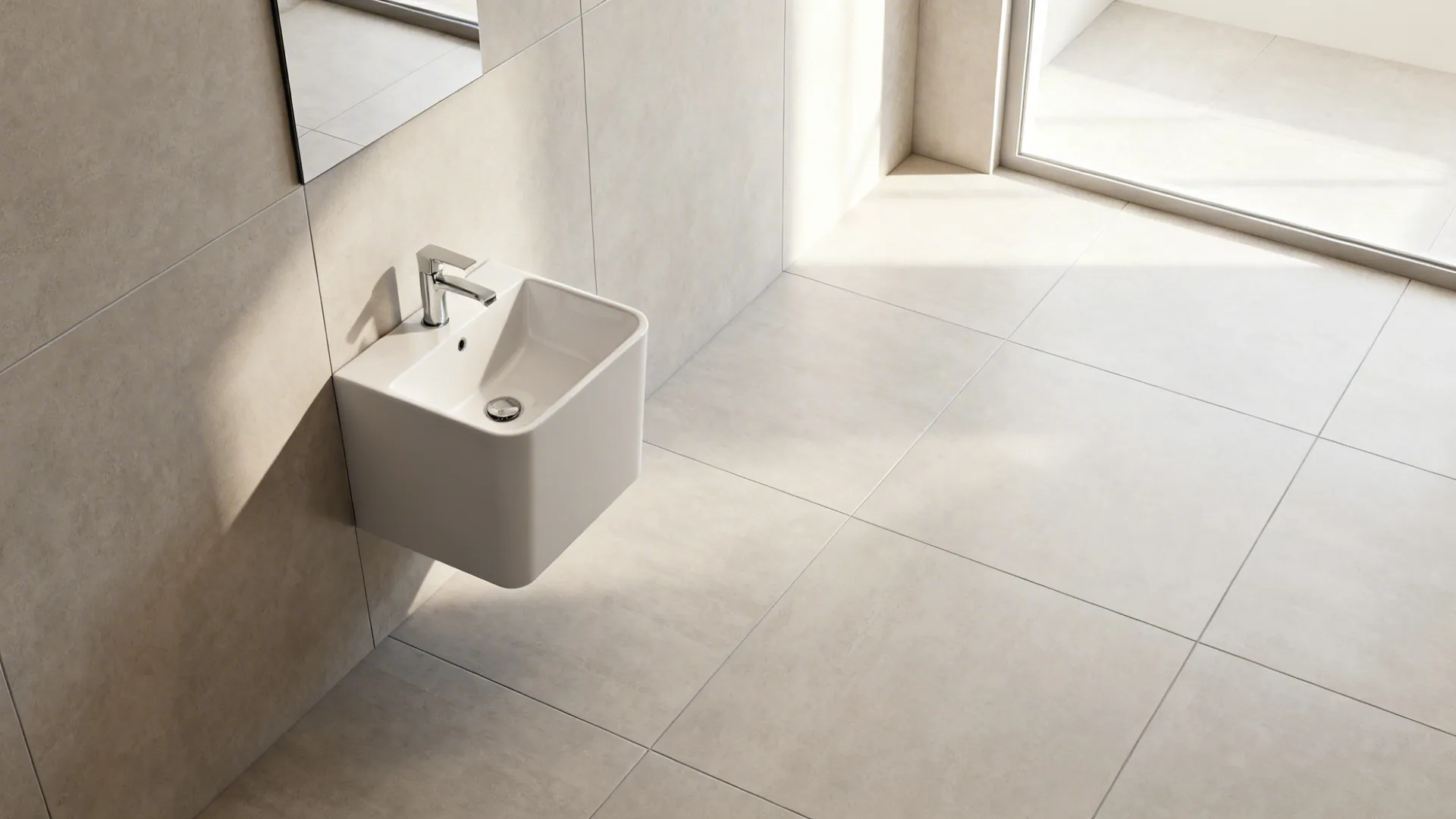 Bathroom with large light-colored porcelain tiles creating a seamless look.