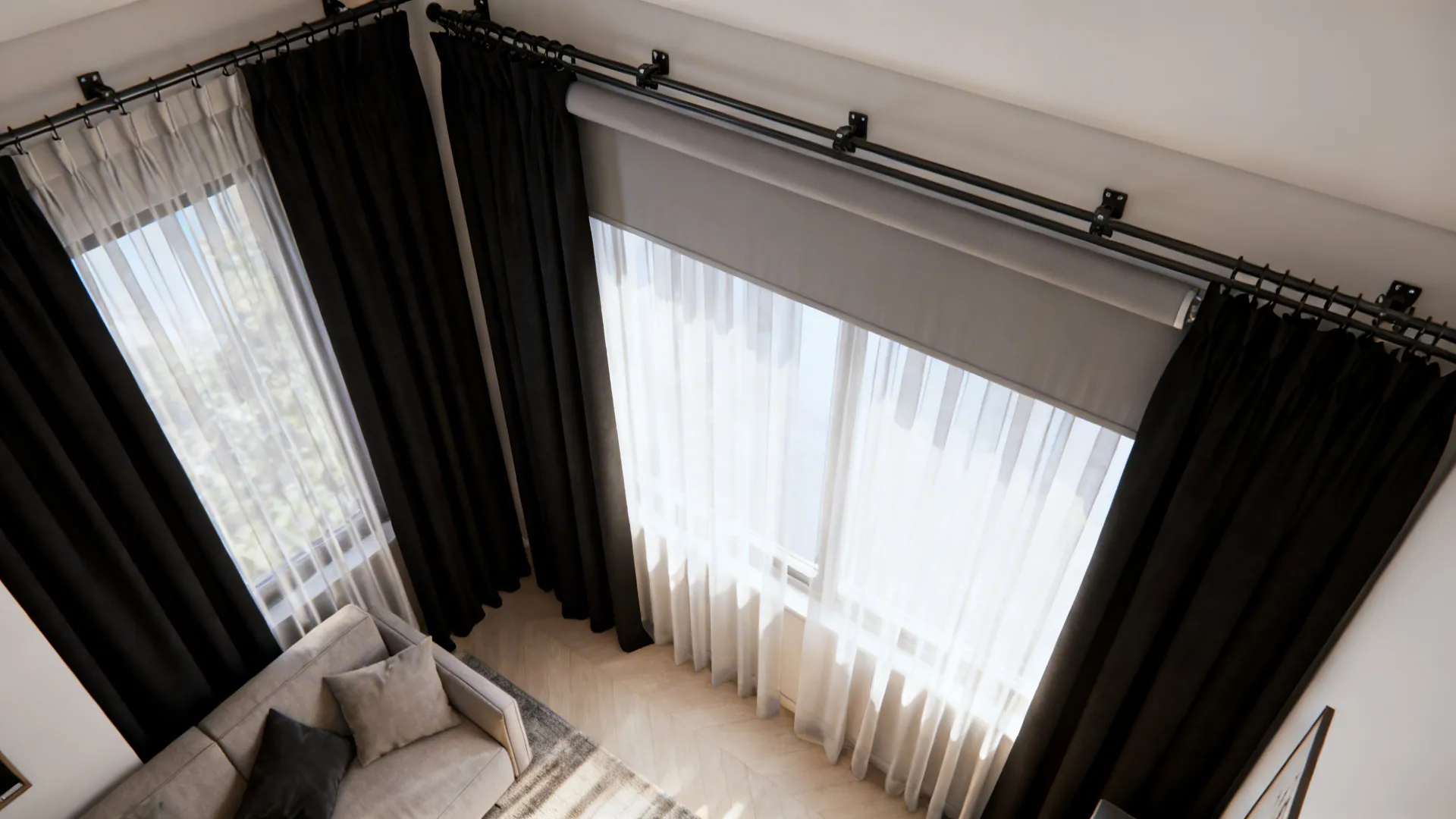 Layered window treatments with black blackout curtains, sheers, and roller blind in a small living room