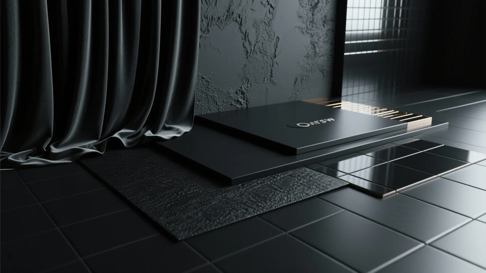 Close up view of black interior materials including dark curtain tiles and textured wall panel